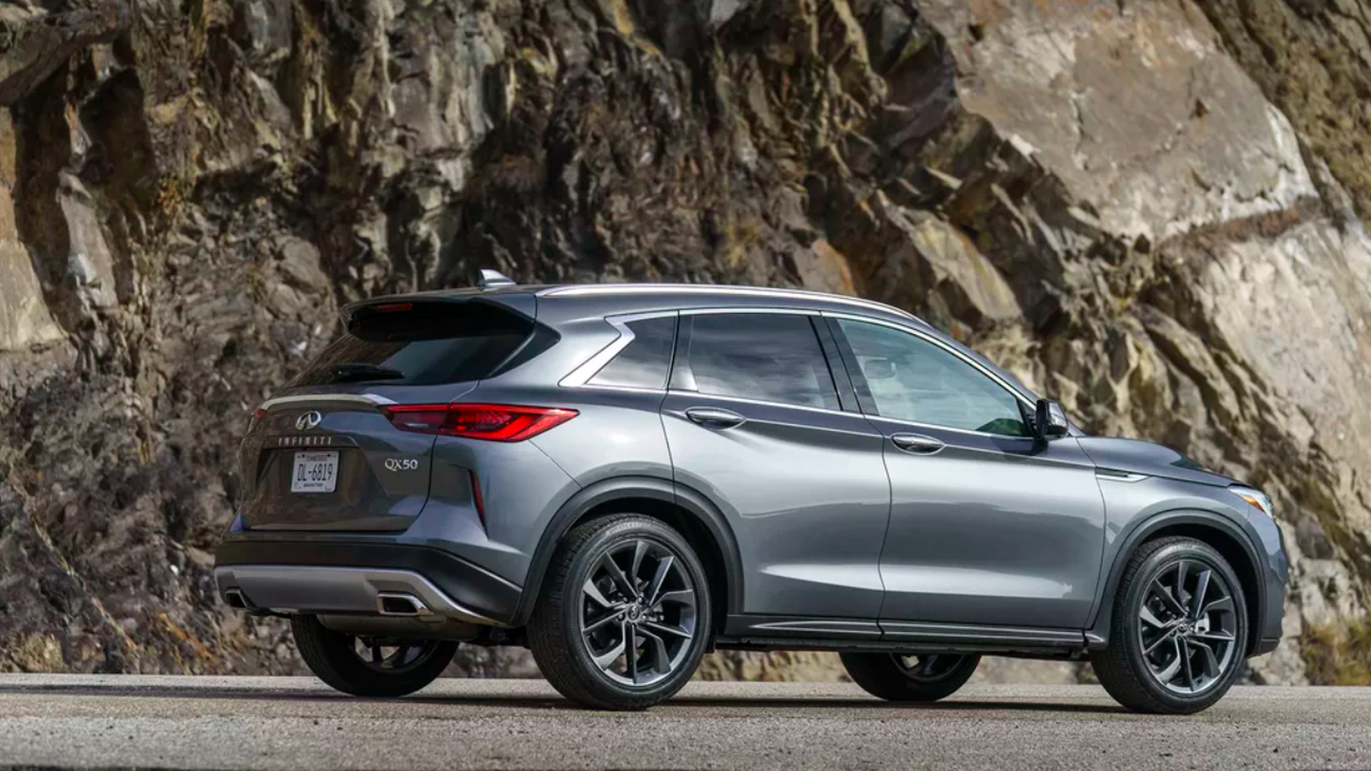 In this image, the Infiniti Qx50 is seen while driving on a mountainous pass.