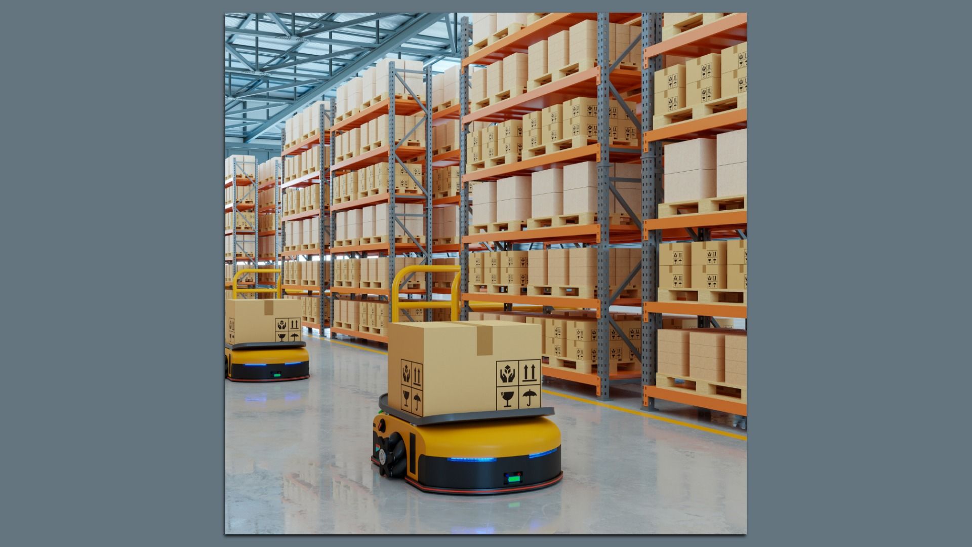 Autonomous yellow robot cart navigates a large warehouse aisle, flanked by tall orange metal shelves filled with uniform brown cardboard boxes.