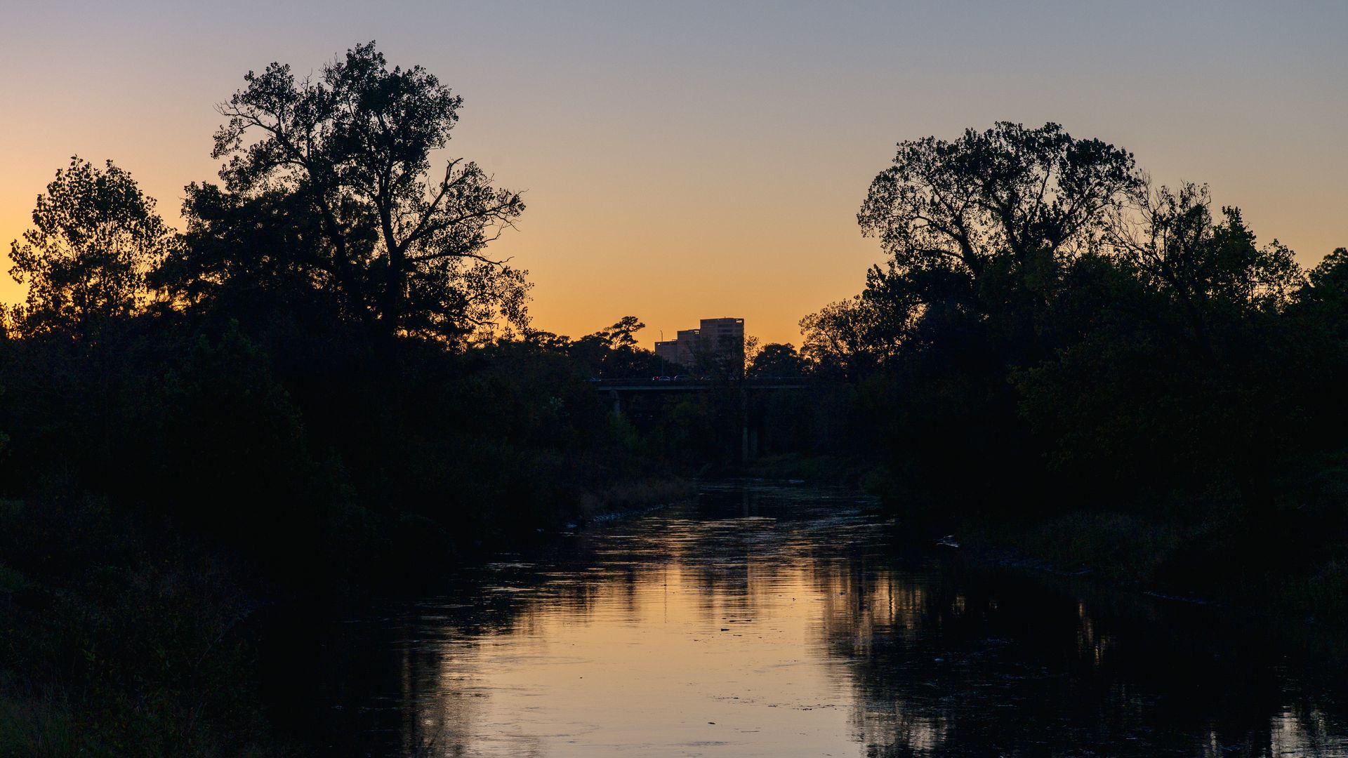 The Buffalo Bayou is seen at sunset in Houston, Texas.