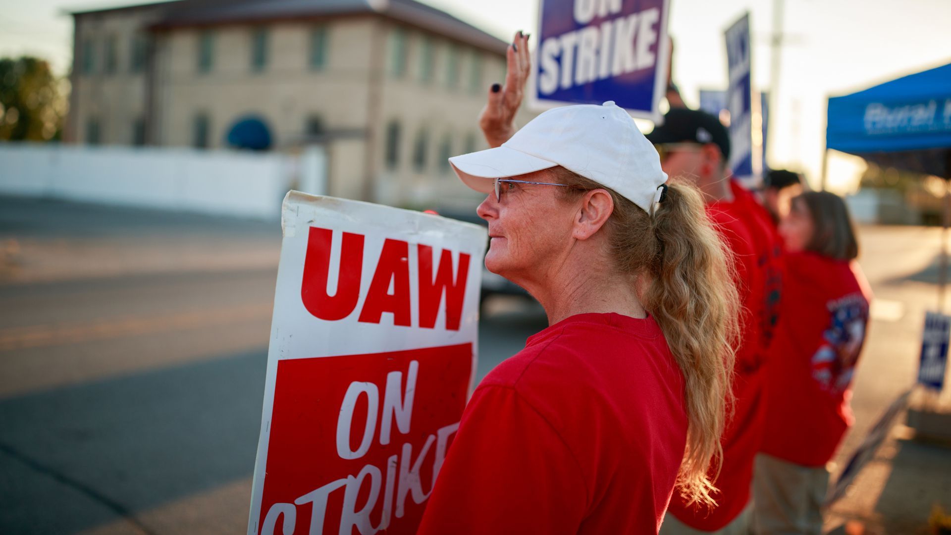 Striking GM workers at a powertrain plant in Bedford, Ind.