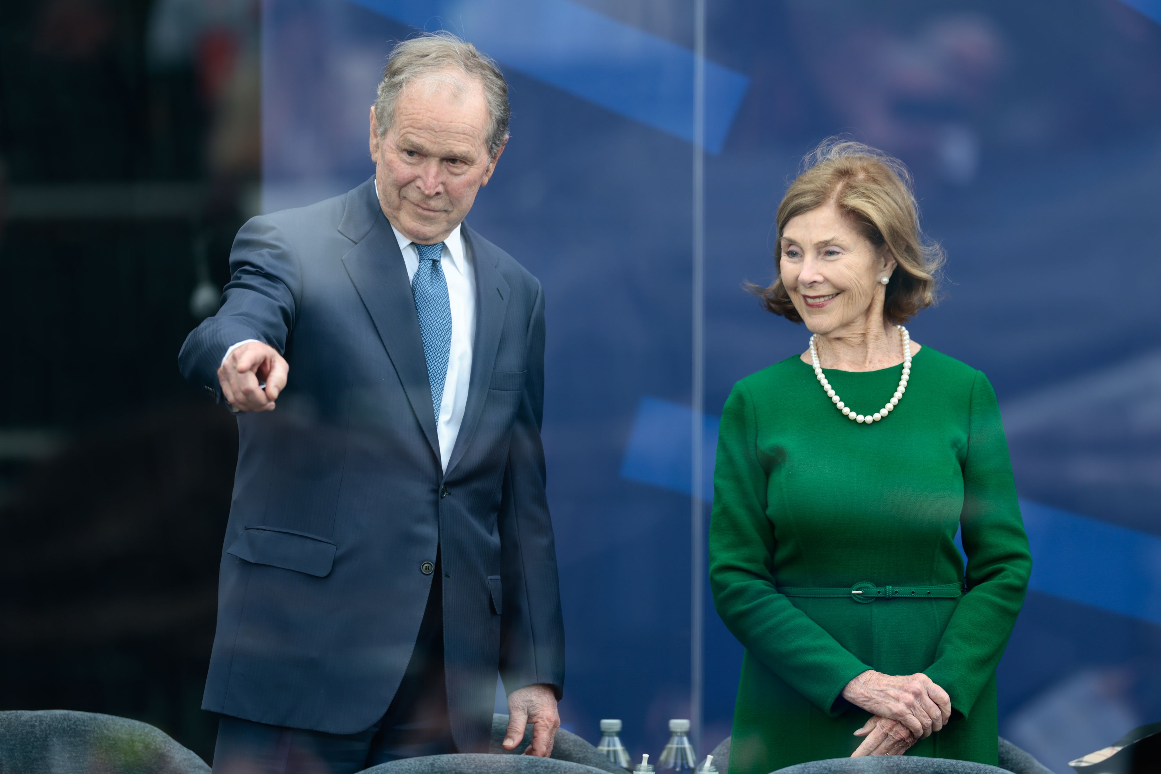 Former President George W. Bush and First Lady Laura Bush arrive for the opening of the Obama Presidential Center in Chicago last month.