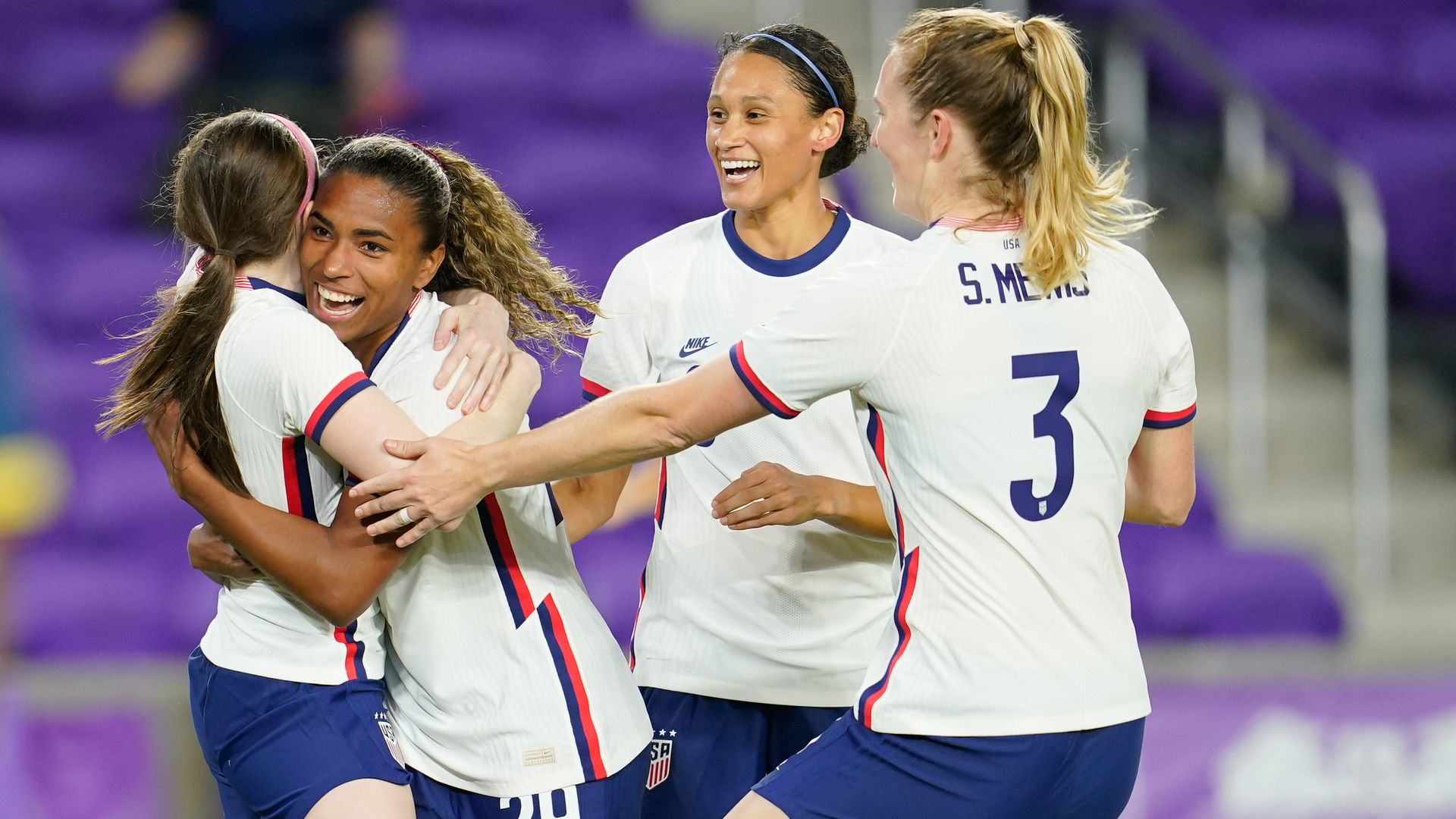 USWNT celebrating