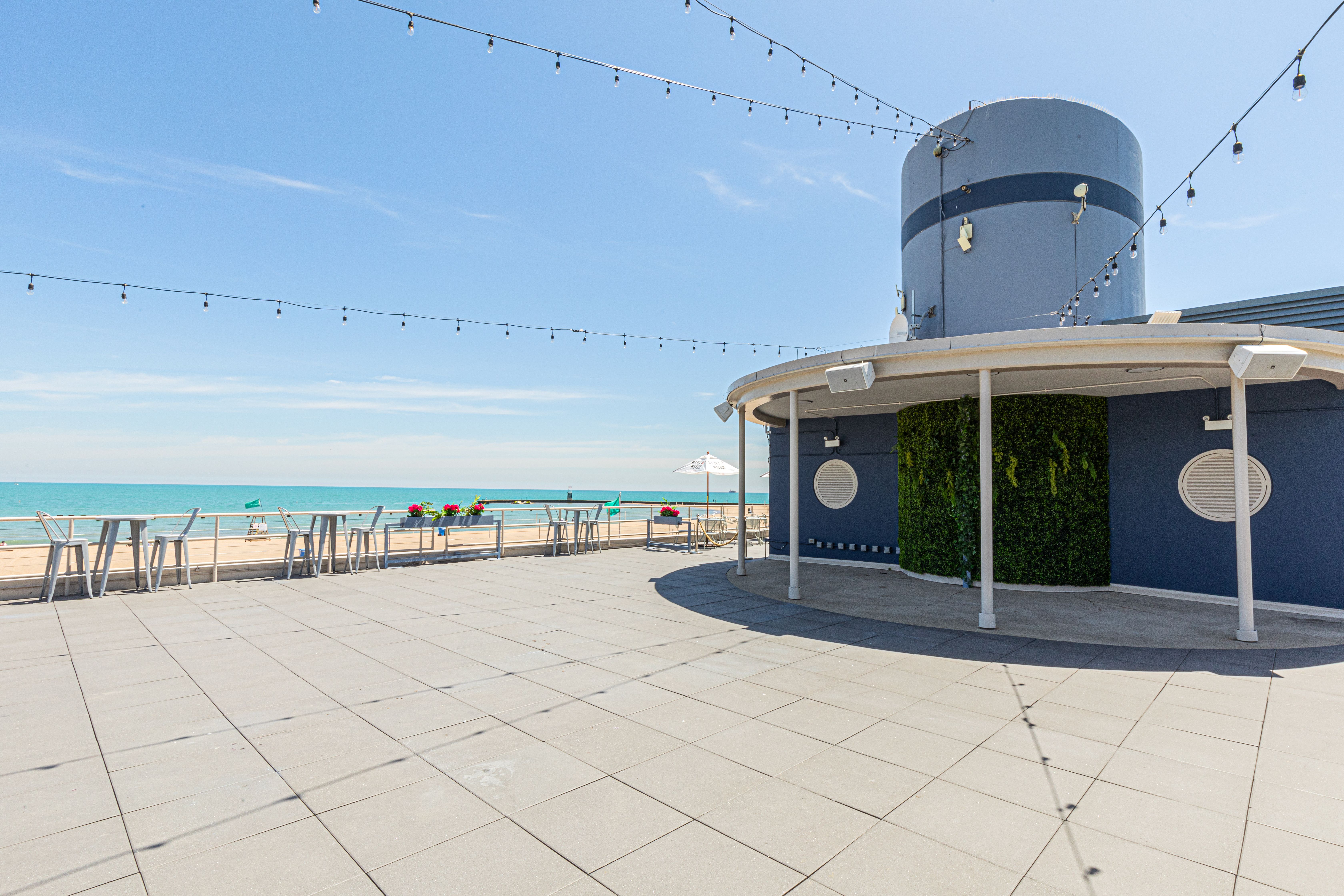 Outdoor patio with views of the beach.