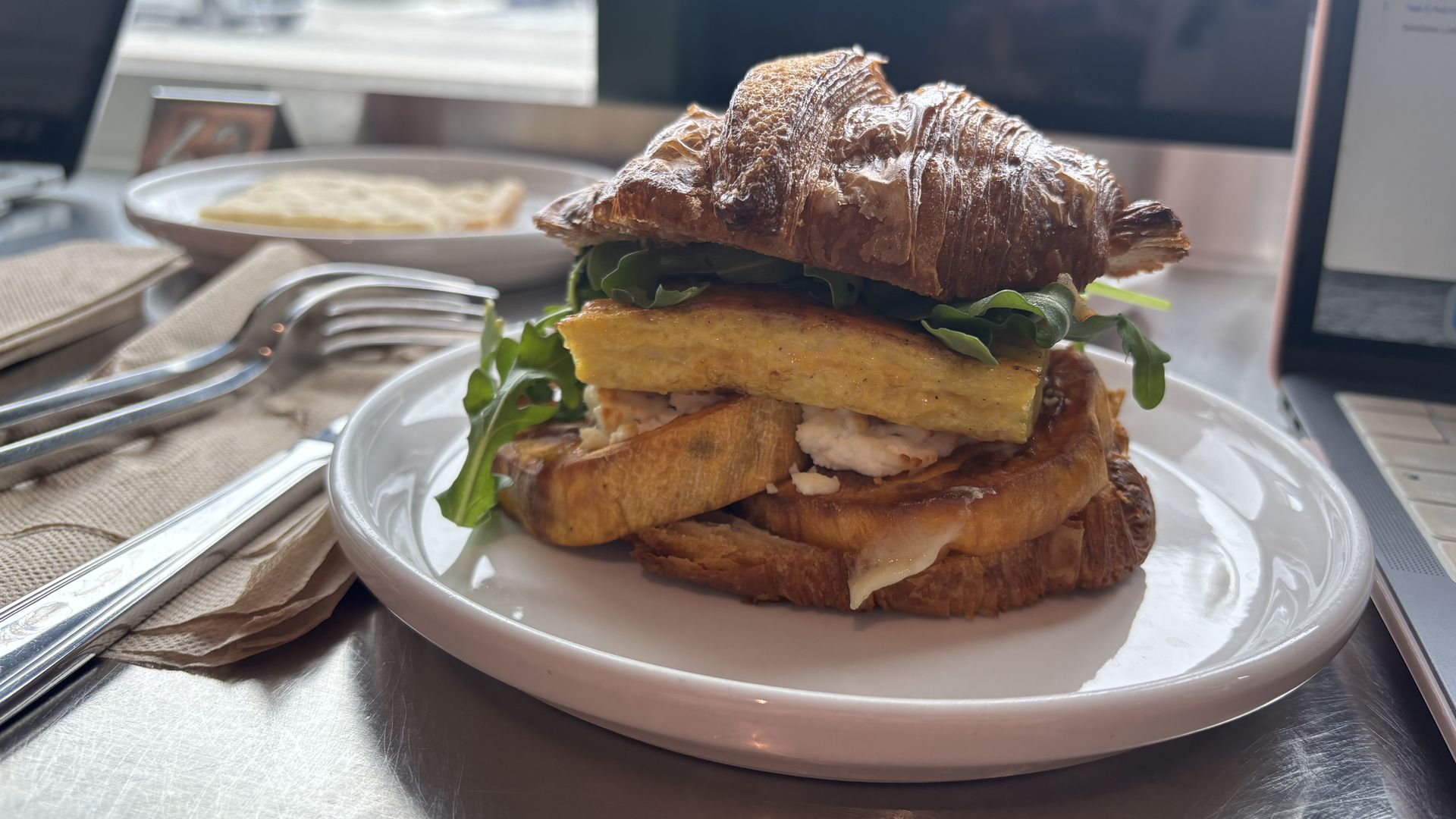 Croissant sandwich on a plate