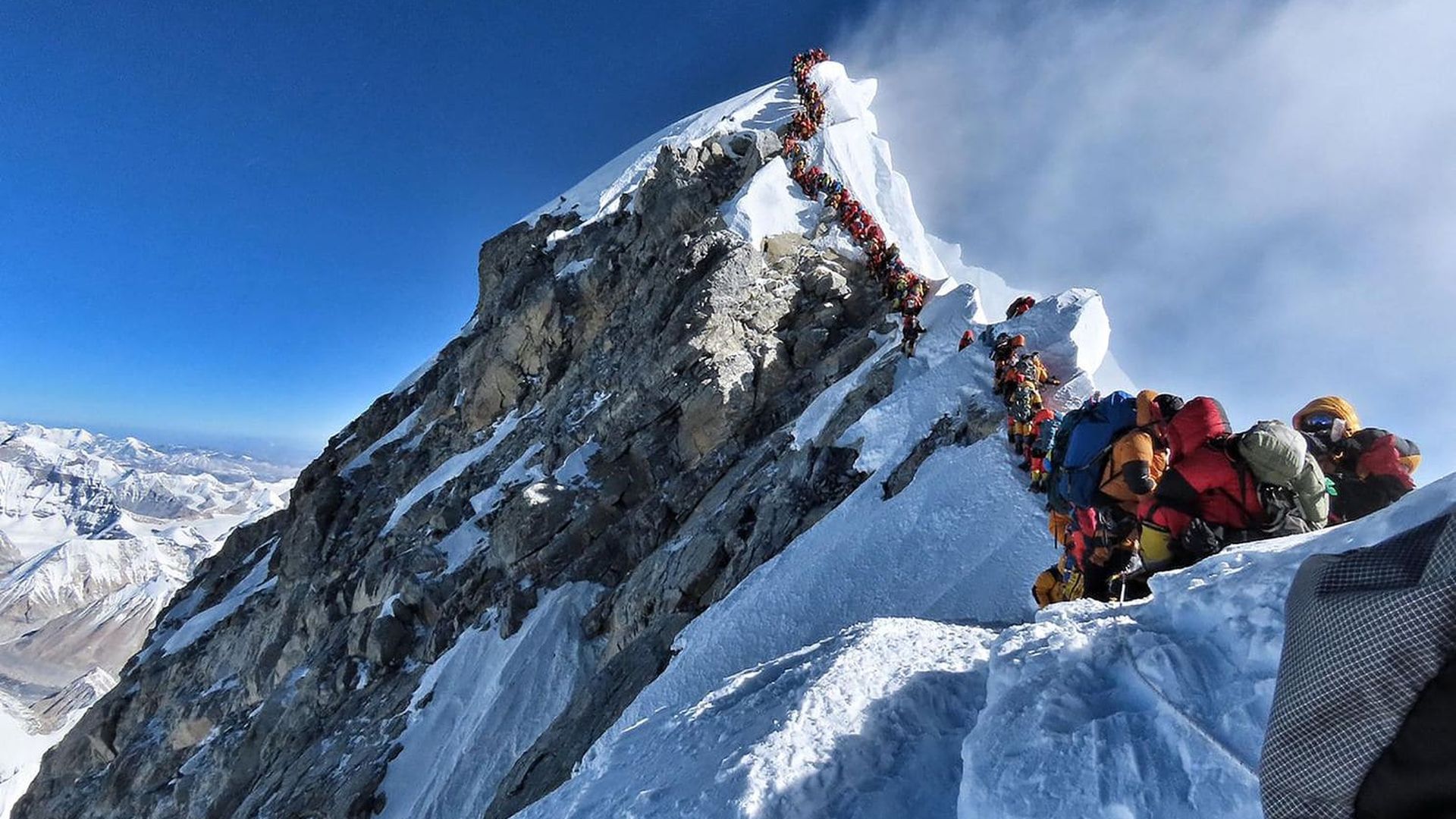 Mountain climbers line up to stand at Mount Everest’s summit on May 22. (Nirmal Purja/Project Possible/AFP/Getty Images)