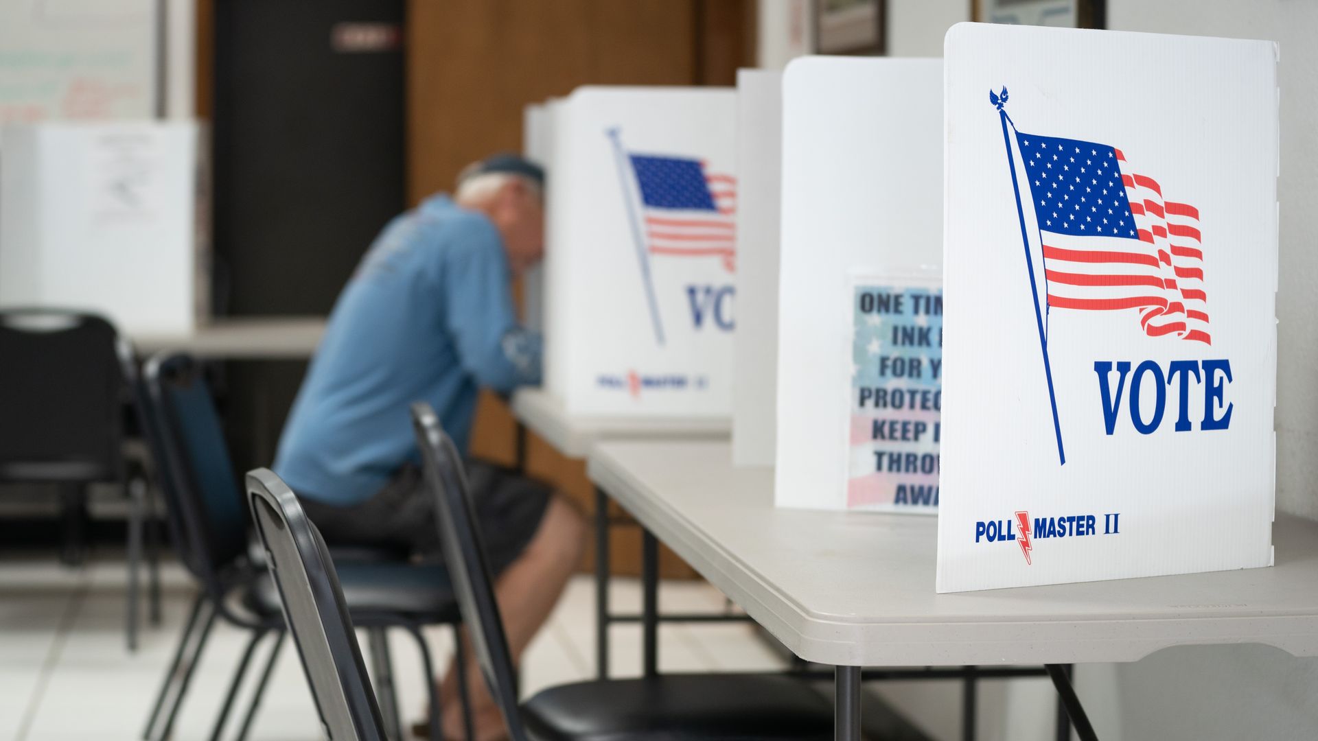 MT. GILEAD, NC - MAY 17: A man fills out a ballot at a voting booth on May 17, 2022 in Mt. Gilead, North Carolina. North Carolina is one of several states holding midterm primary elections.