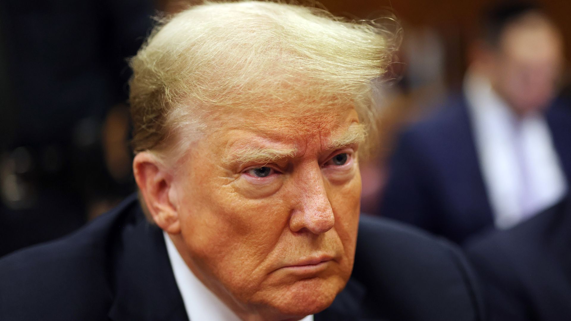 Trump sits in the courtroom during his New York hush money trial.