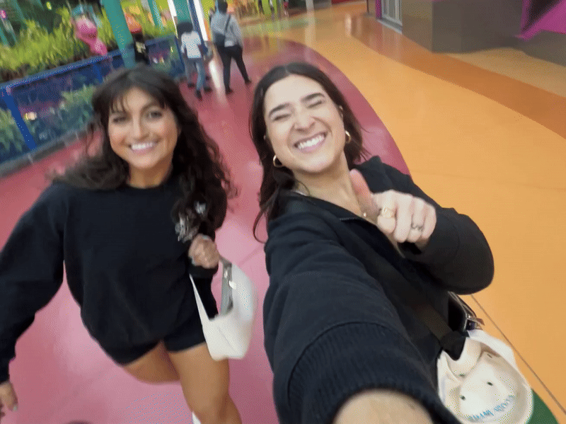 McKenzie and Alex walking and smiling