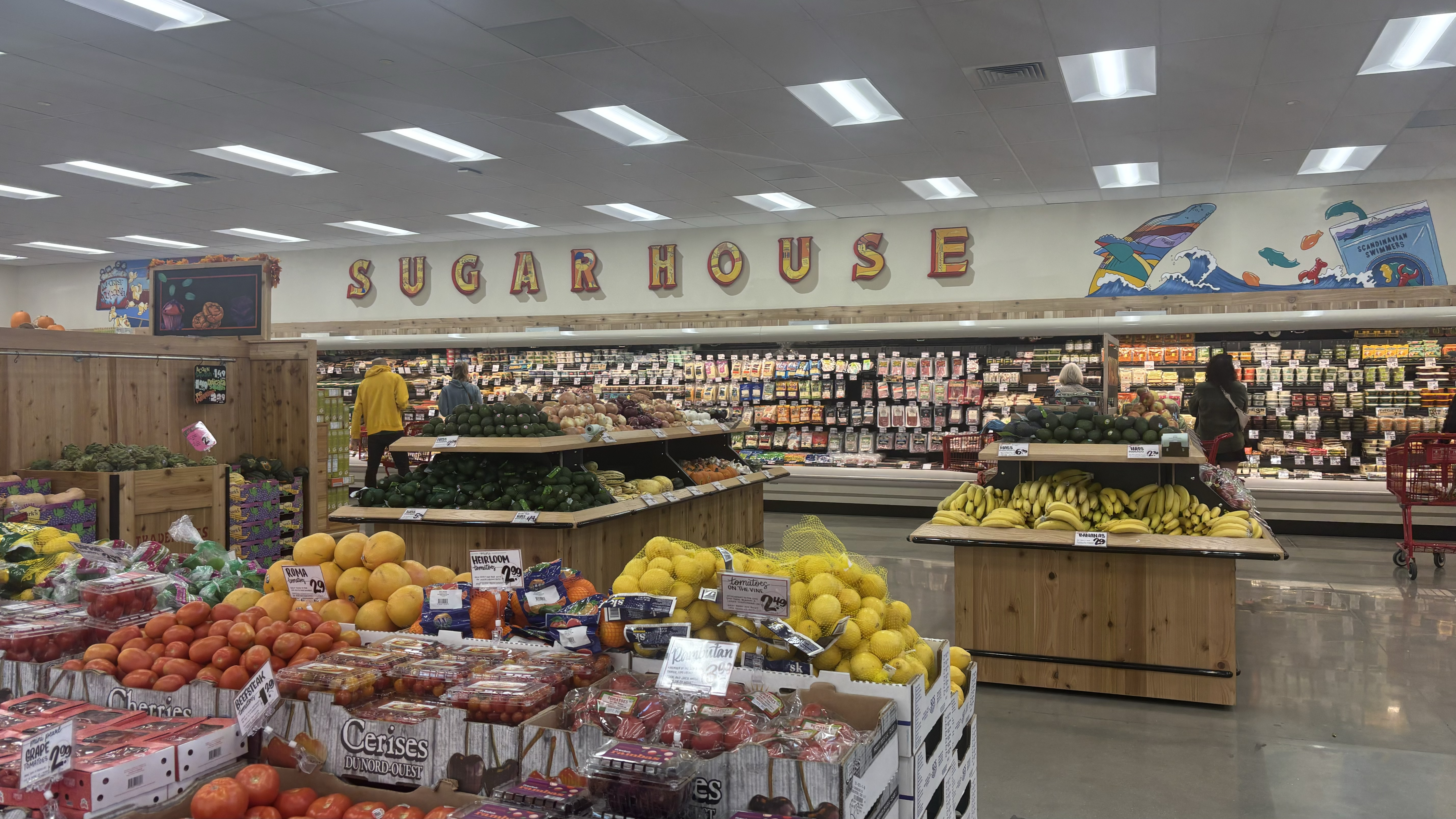 A Trader Joe's interior with the words Sugar House displayed on the wall.
