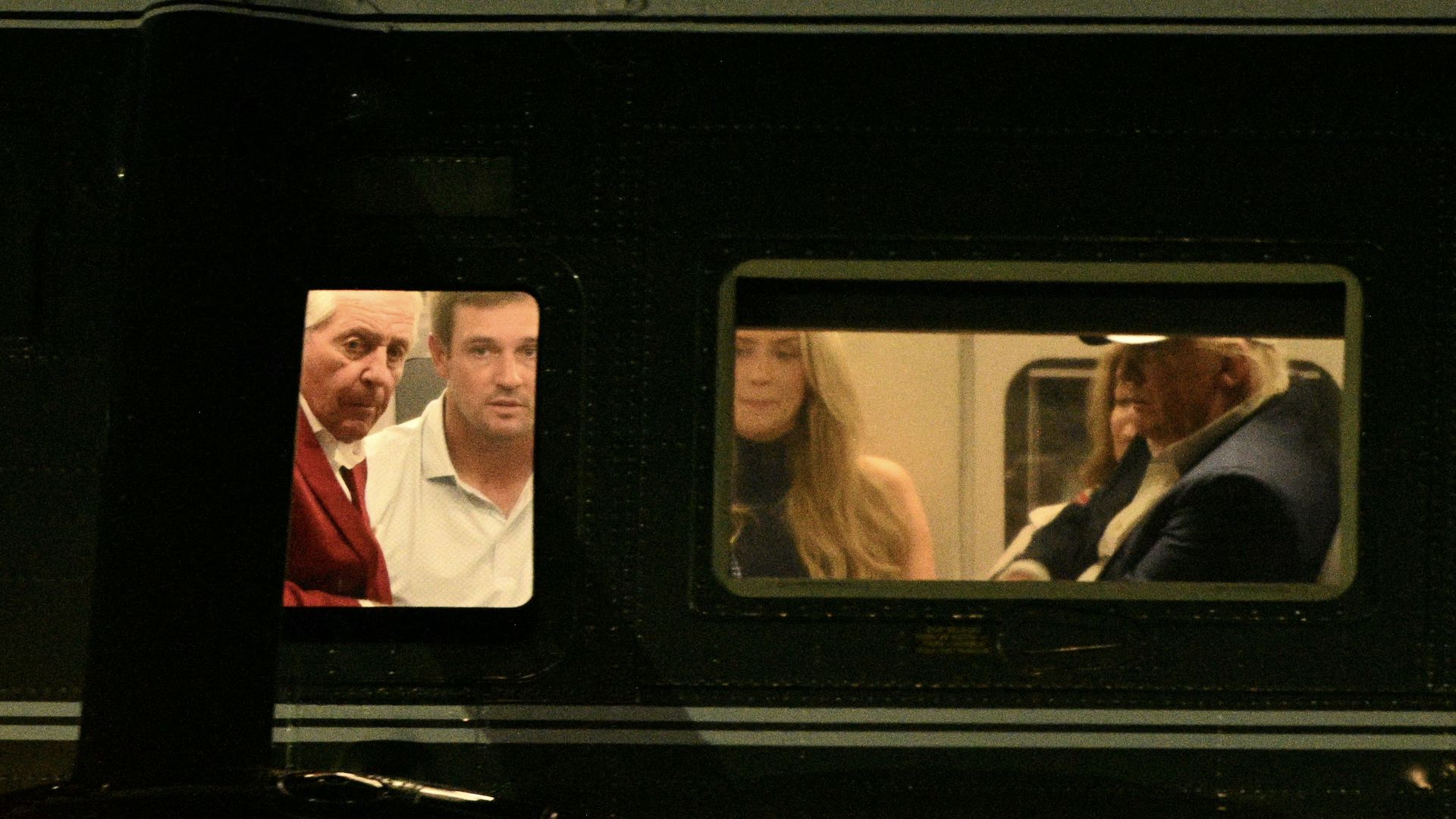 President Donald Trump is seen aboard Marine One alongside US golfer Bryson DeChambeau and Mikayla Demaiter as it lands at the Ellipse near the White House in Washington, DC, on September 19, 2026. Trump is returning from the Camp David presidential retreat. (Photo by Jim WATSON / AFP via Getty Imag