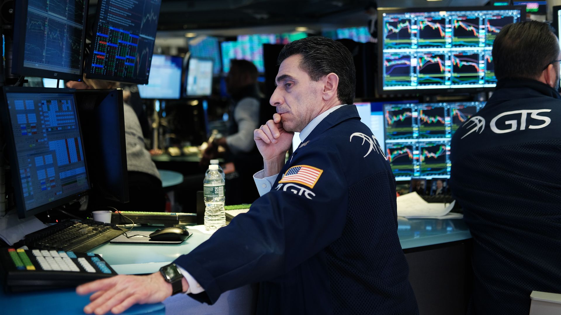 Trade workers on the floor of the New York Stock Exchange
