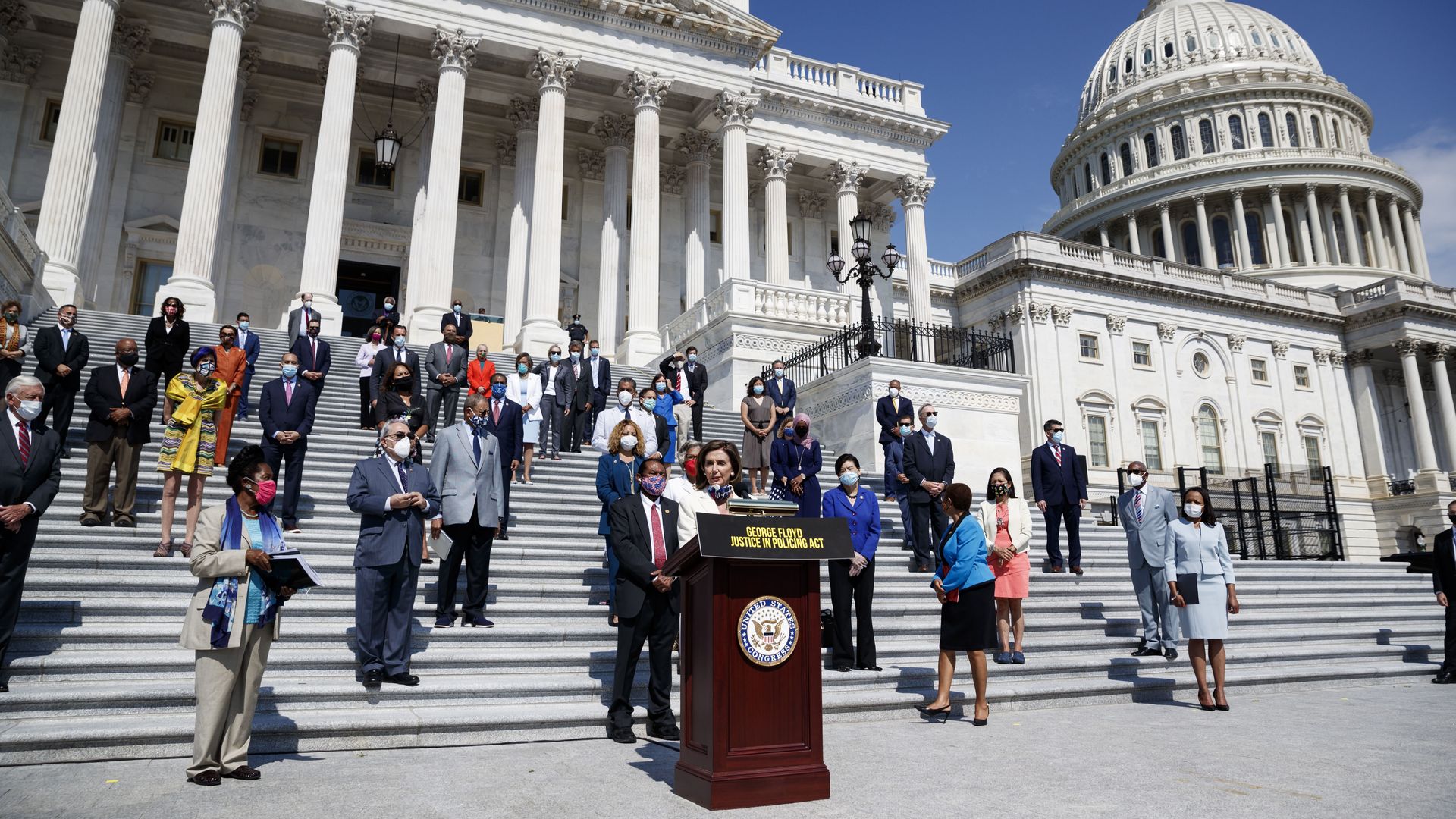 House Speaker Nancy Pelosi and Democrats are seen outside the Capitol after passing the George Floyd Policing Act last June.
