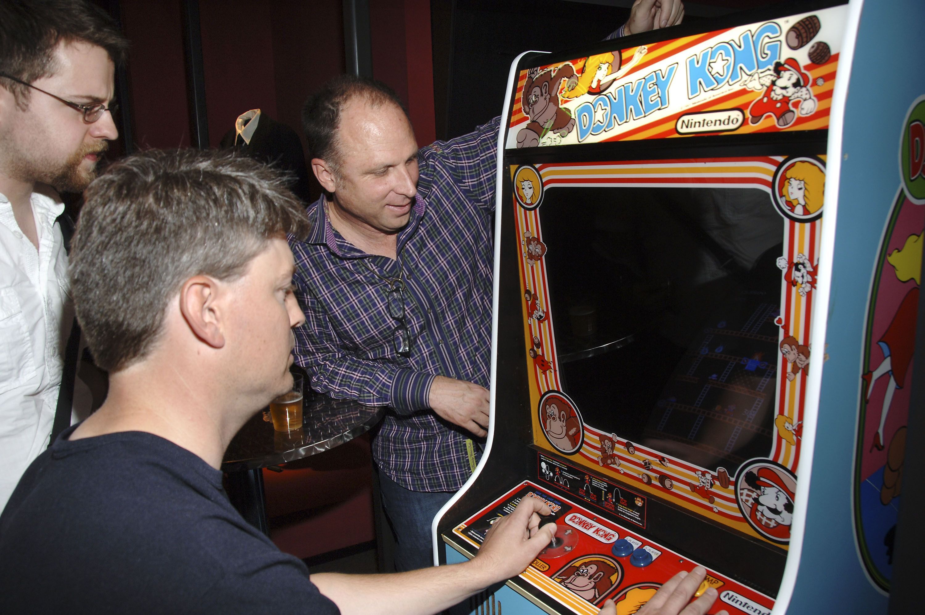 Steve Wiebe (L) plays Donkey Kong at the Museum of the Moving Image in New York City. 