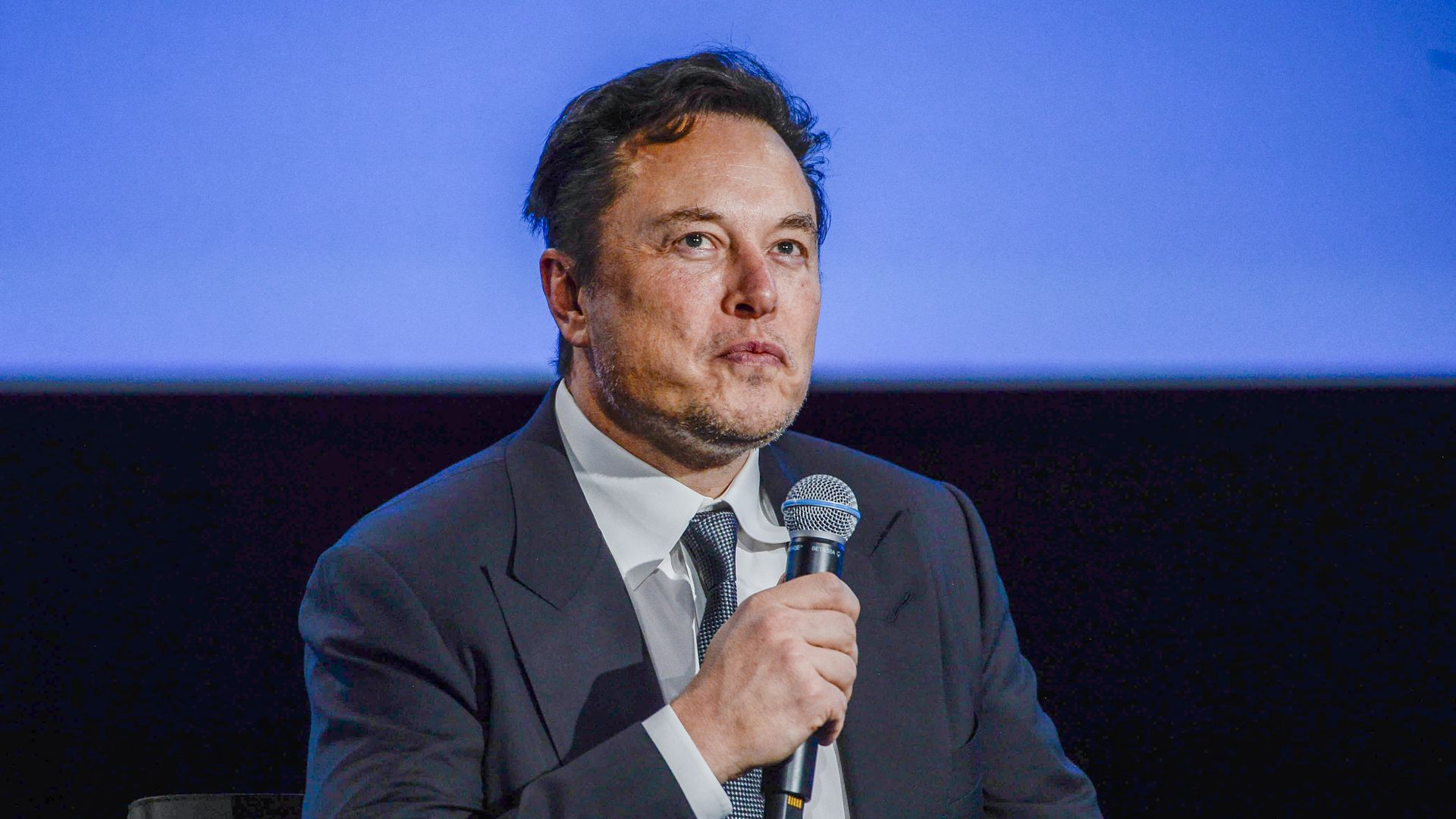 Tesla CEO Elon Musk looks up as he addresses guests at the Offshore Northern Seas 2022 (ONS) meeting in Stavanger, Norway on August 29.
