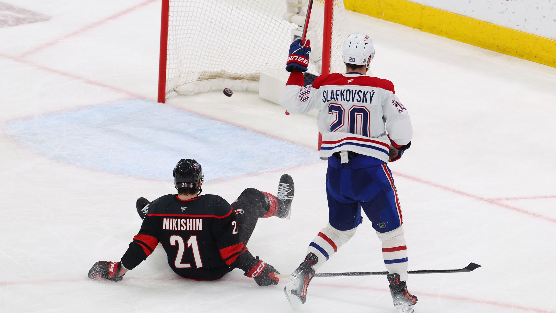 RALEIGH, NORTH CAROLINA - MAY 21: Juraj Slafkovsky #20 of the Montreal Canadiens celebrates after scoring an empty net goal against the Carolina Hurricanes during the third period in Game One of the Eastern Conference Final of the 2026 Stanley Cup Playoffs at Lenovo Center on May 21, 2026 in Raleigh