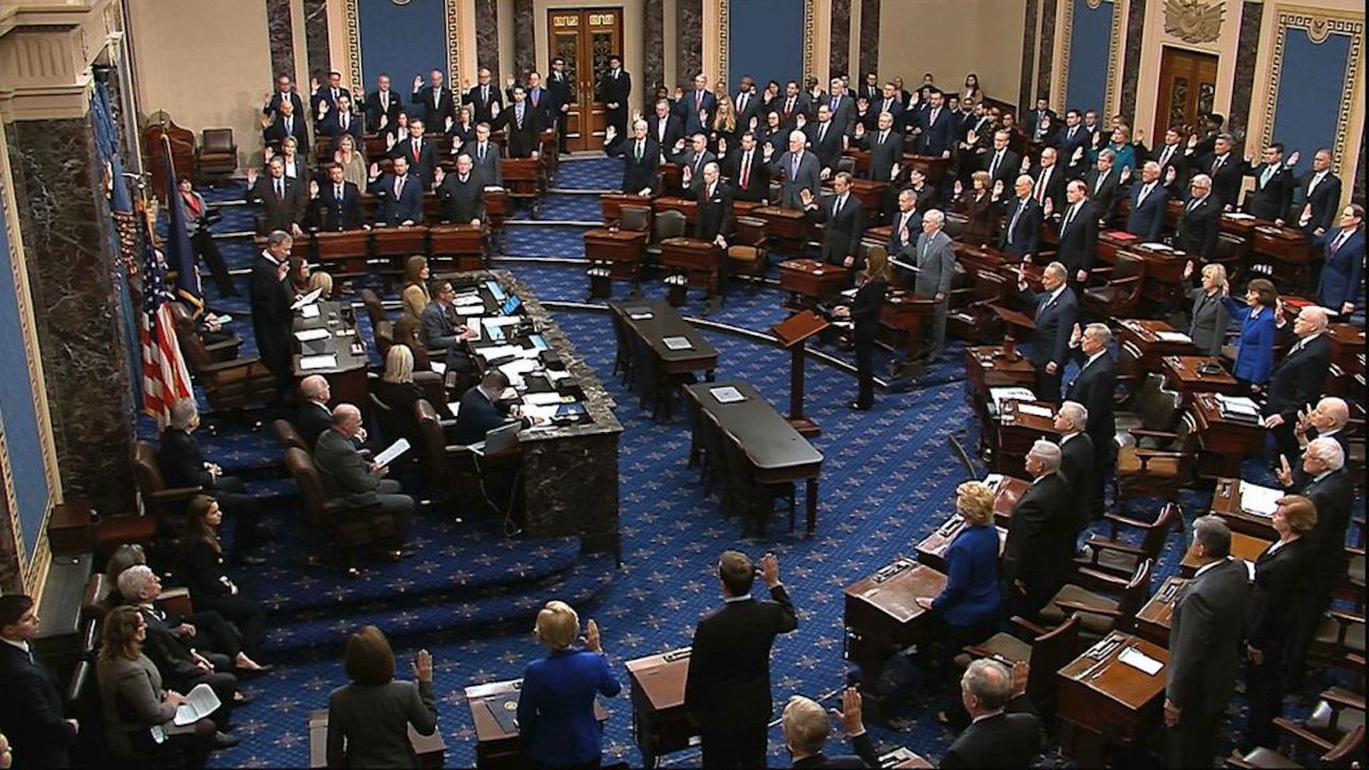 John Roberts swears in members of the Senate for the impeachment trial against President Trump. 