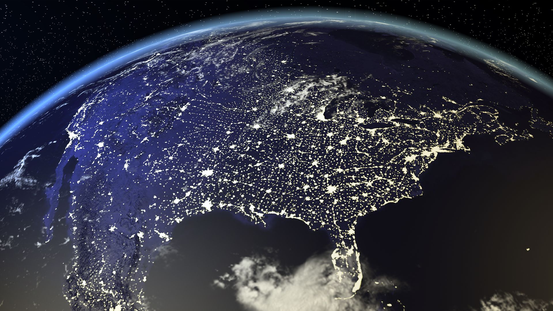 View of the U.S. at night with city lights.