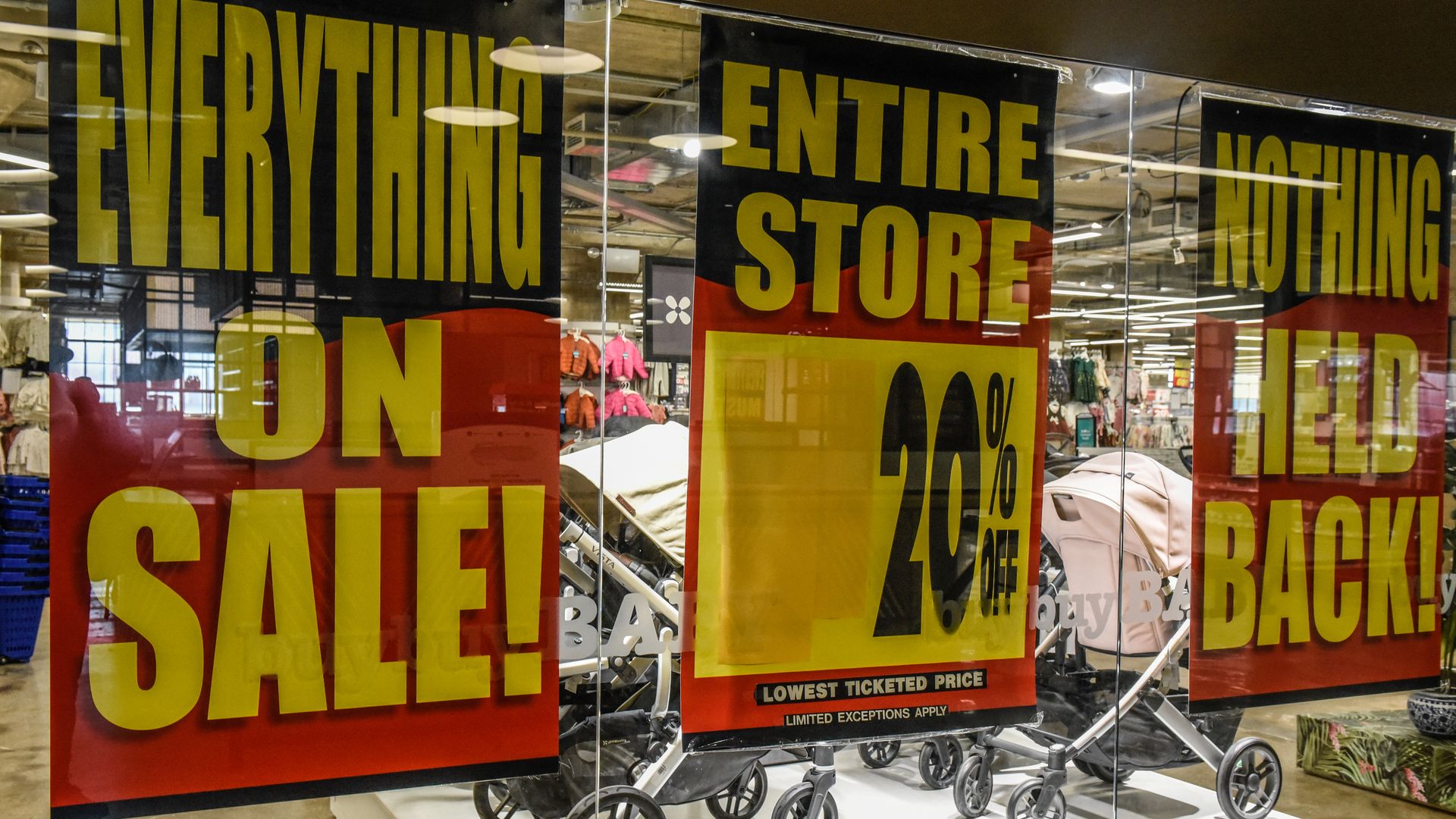 Going out of business signs afixed to a window