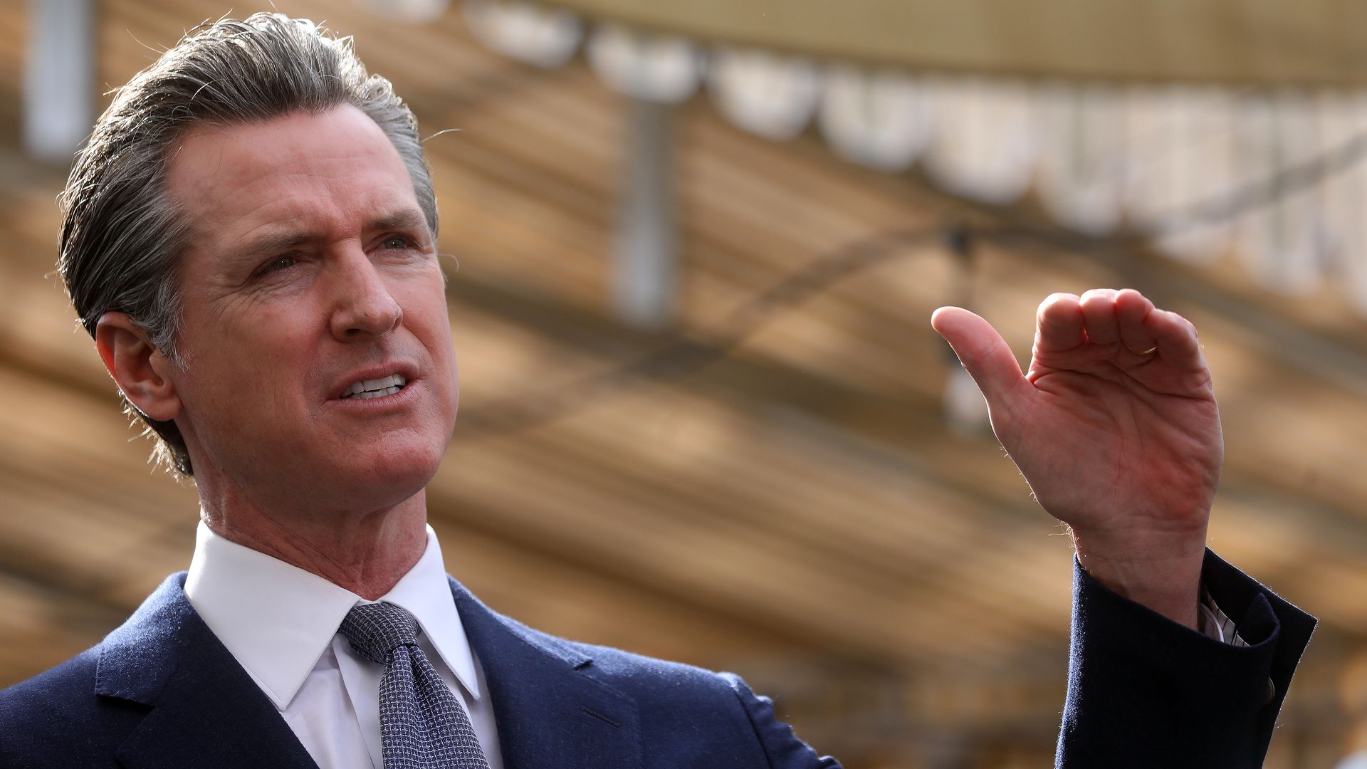Governor Gavin Newsom speaks at a press conference on Wednesday, Feb. 9, 2022, in Oakland, Calif.