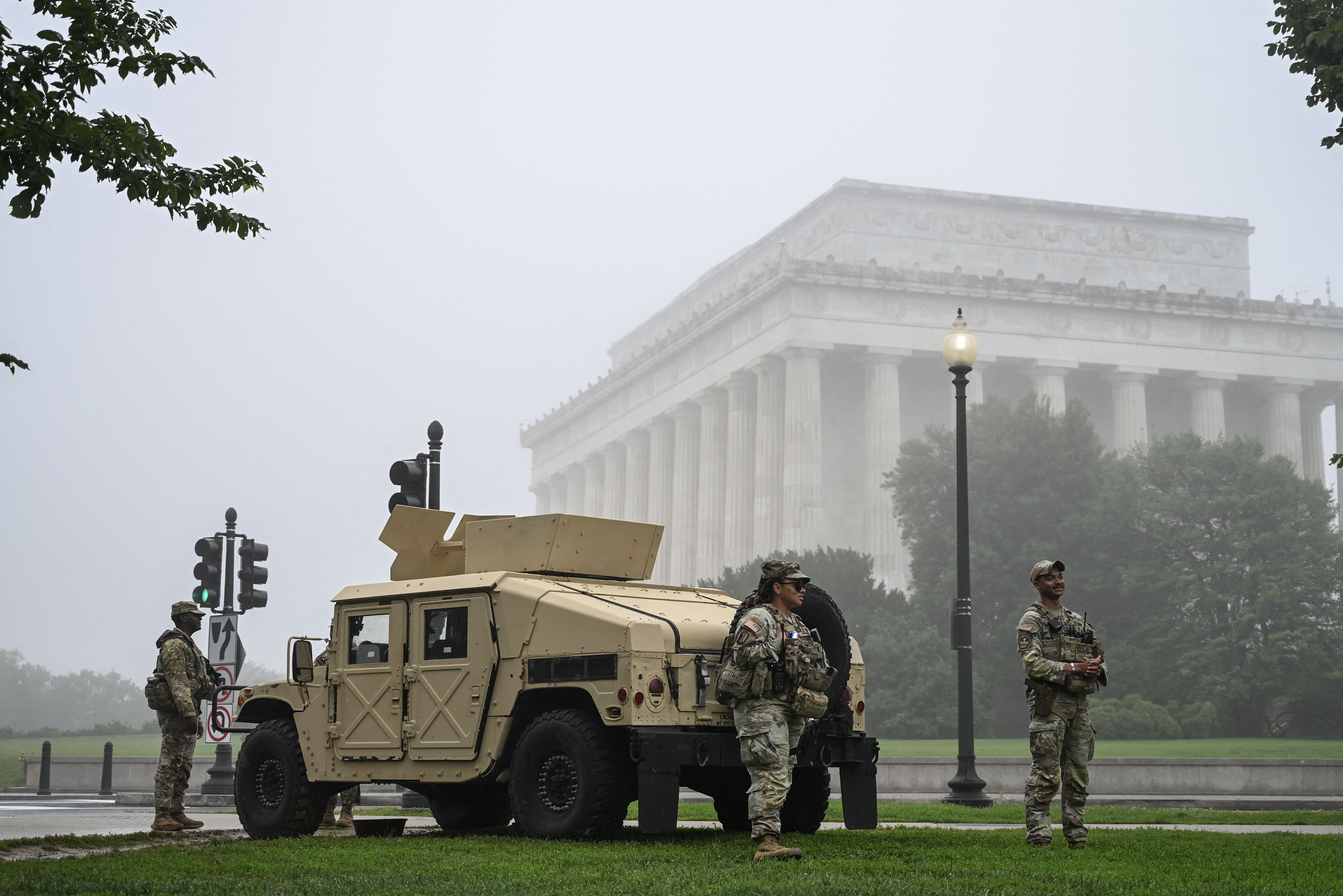 National Guard members stand watch near the Lincoln Memorial last month.