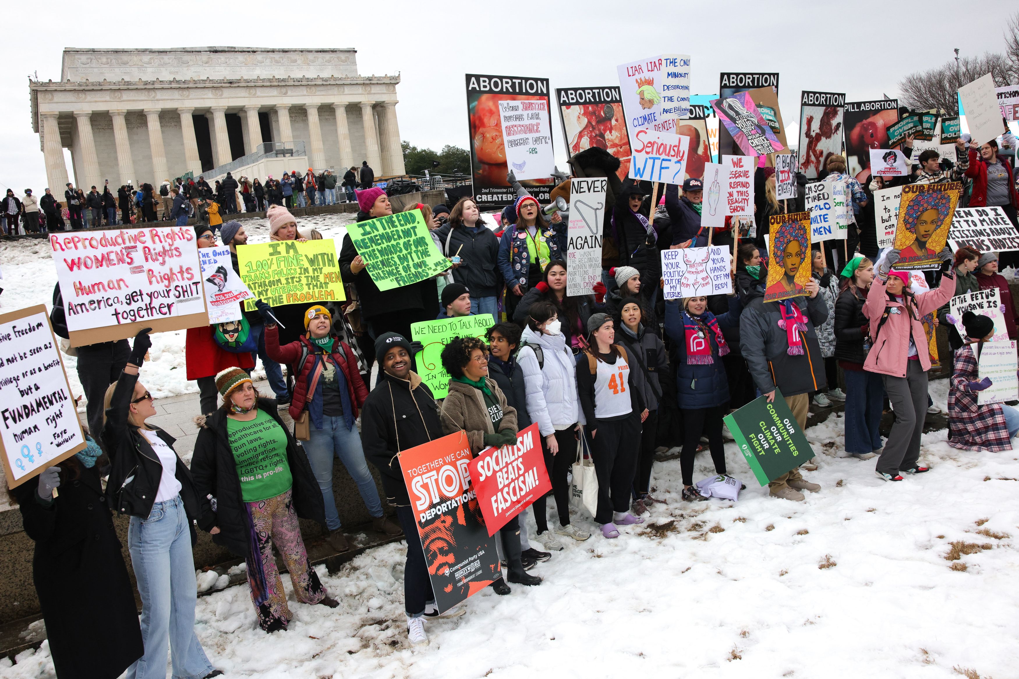 A photo of protestors outside of the Lincoln Memorial.