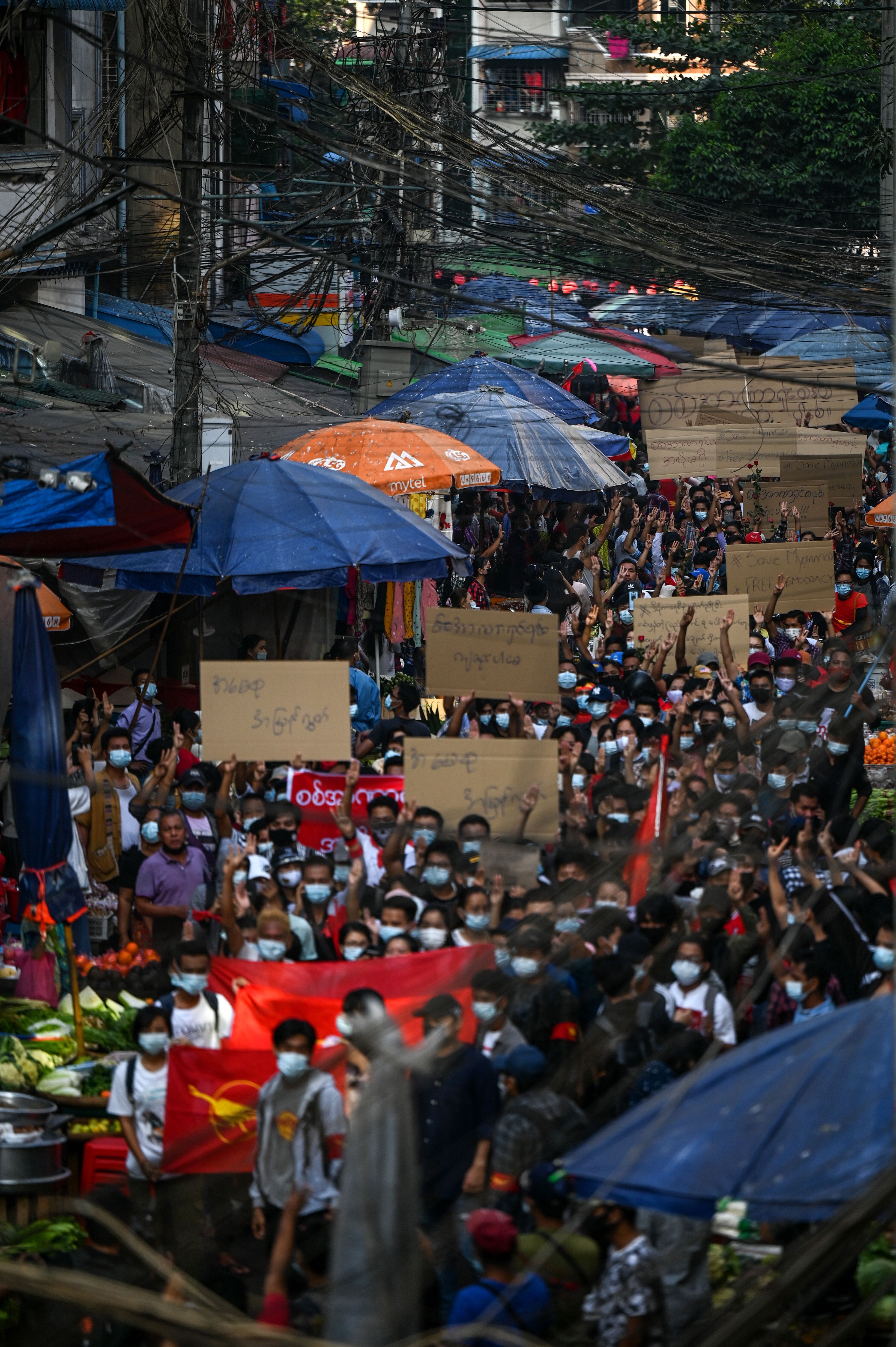  Protesters take part in a demonstration against the military coup in Yangon on February 7