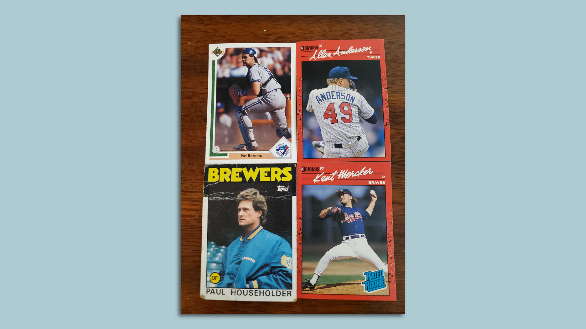 Four baseball cards in a square.