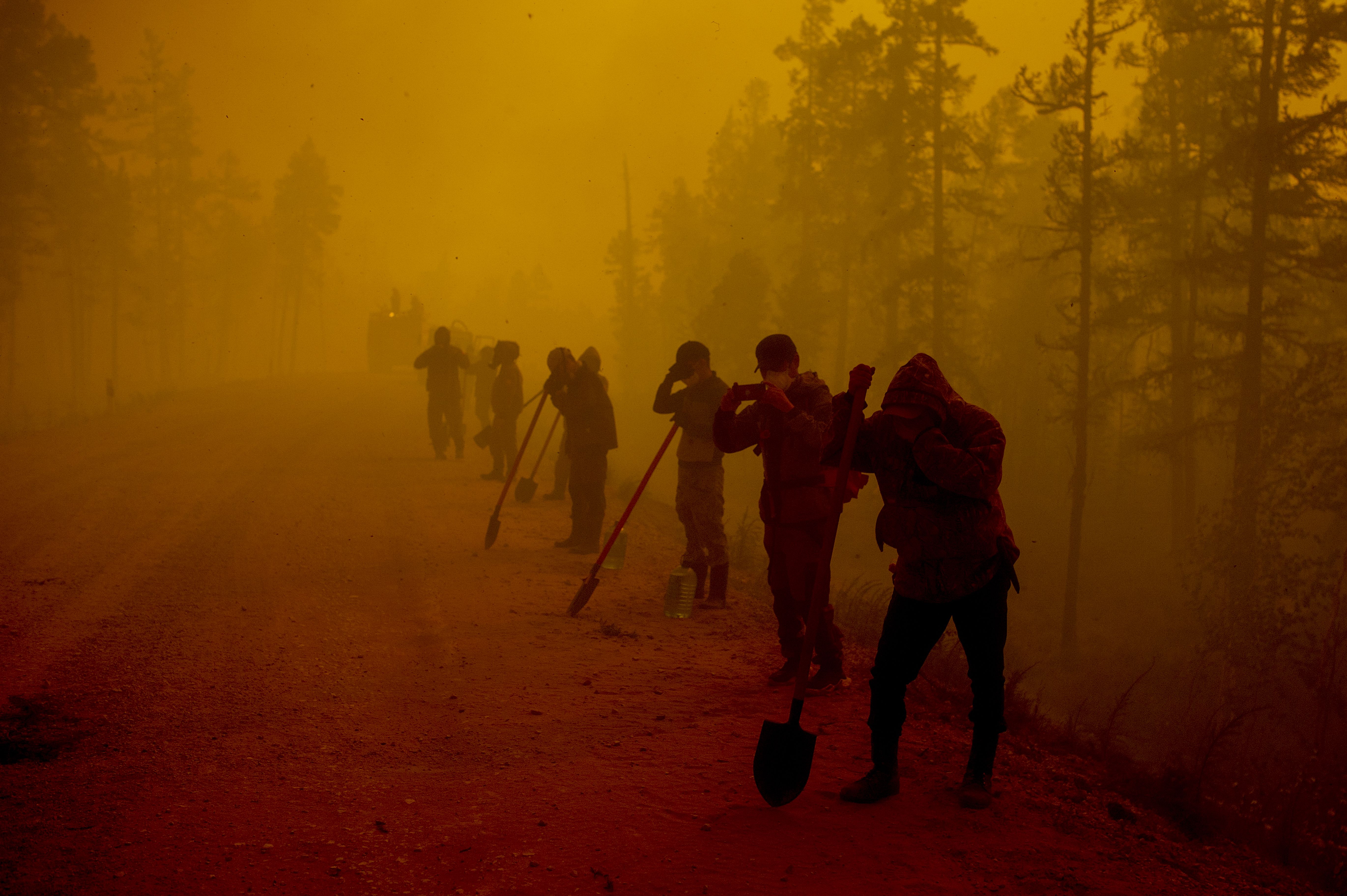 Firefighters in Siberia march into the haze