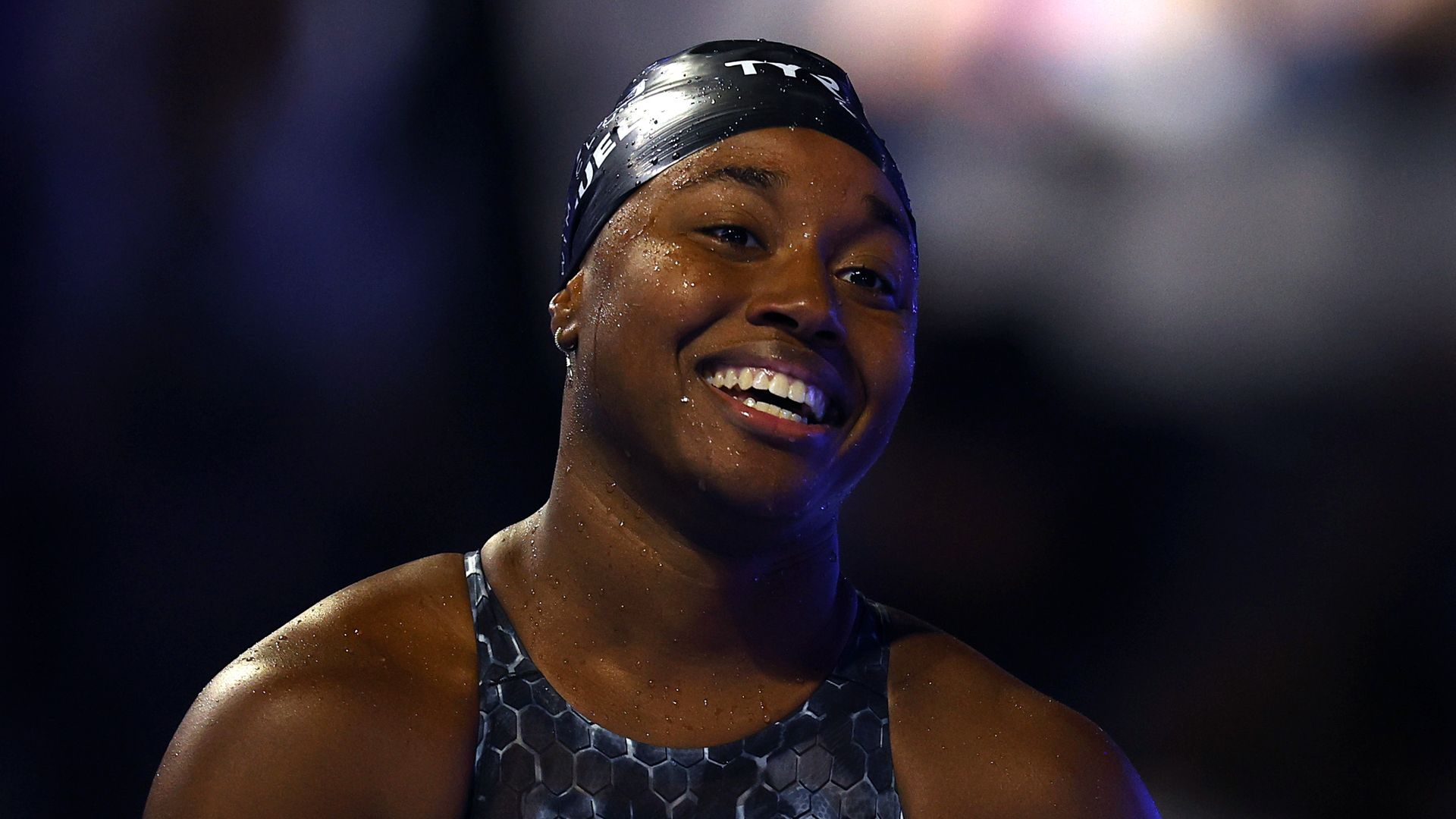 Simone Manuel of the United States reacts after competing in the Women's 50m freestyle final during Day Eight of the 2021 U.S. Olympic Team Swimming Trials