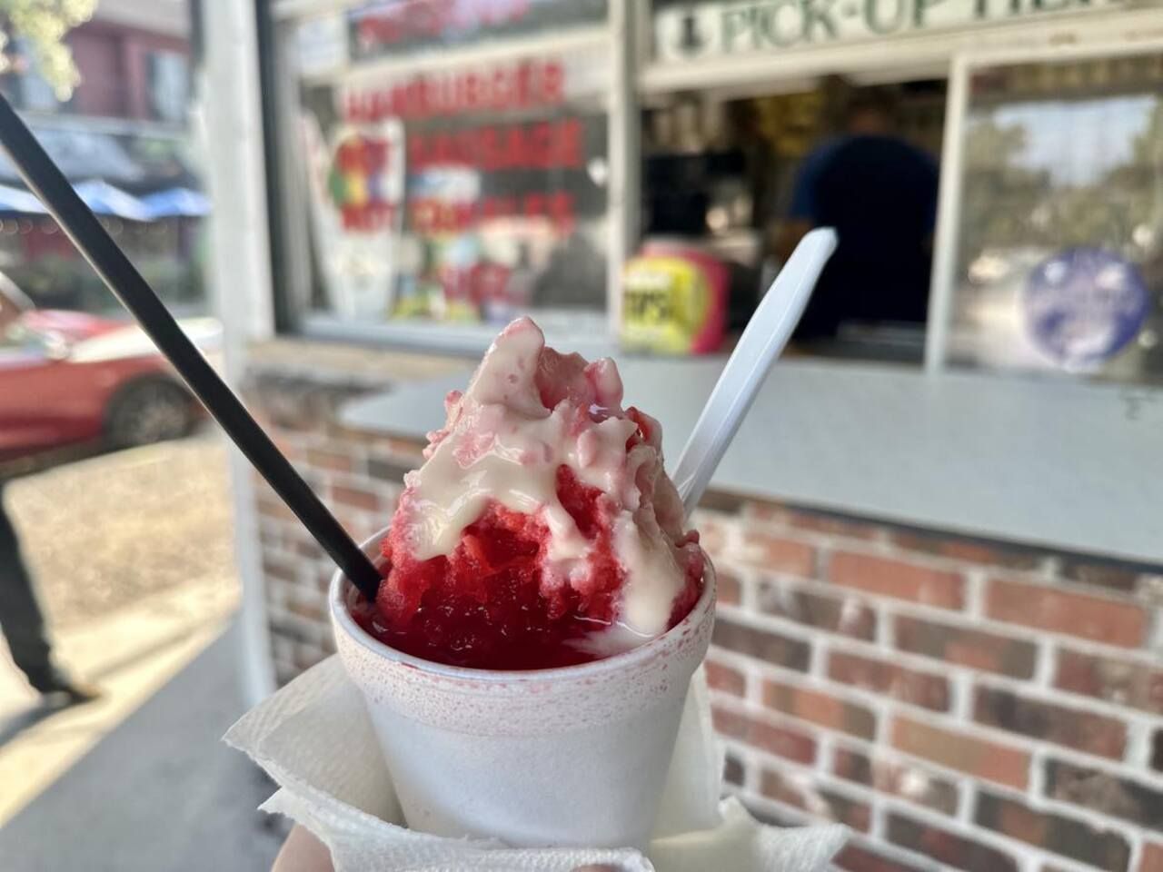 Photo shows a strawberry snoball with cream