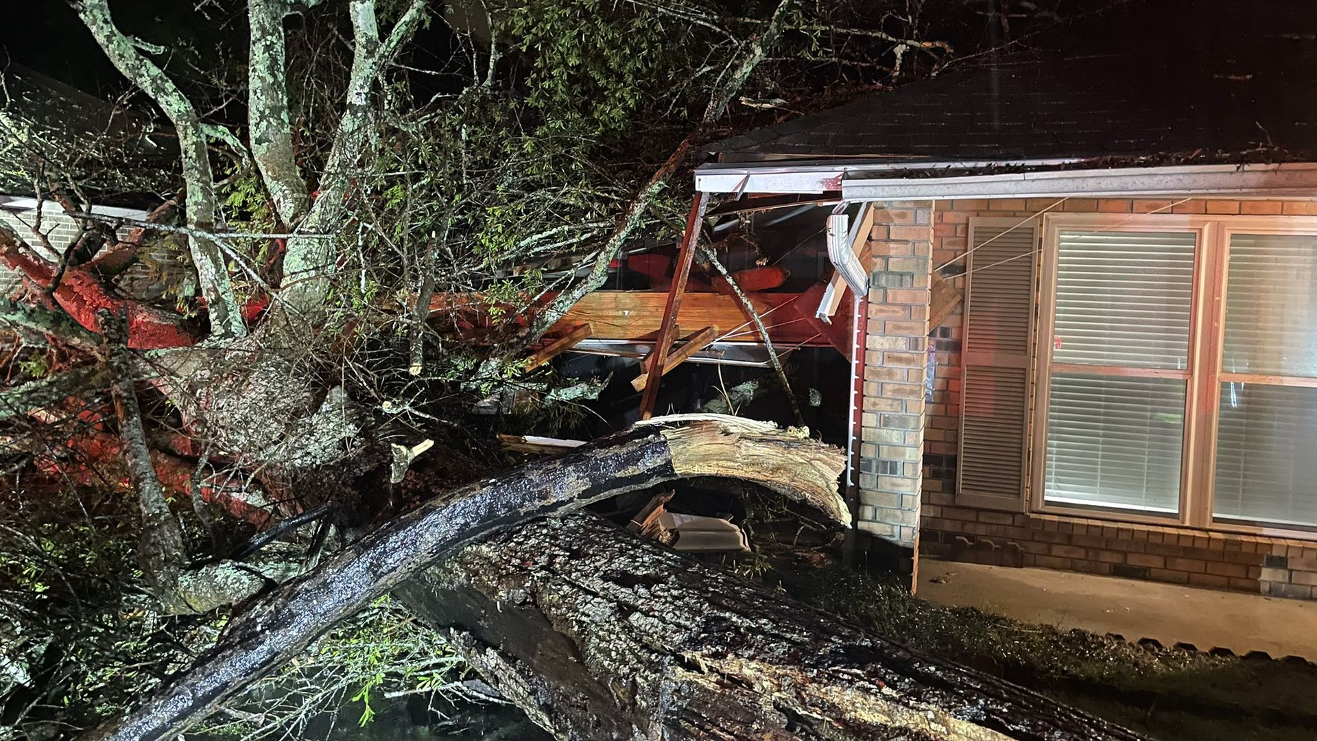 A tree fell on a home carport damaged a vehicle off Sullivan Rd in St Landry Parish, La.