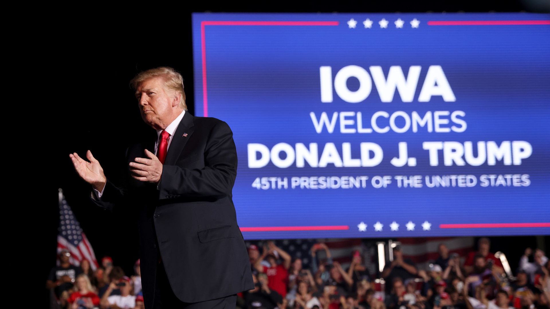 Former President Donald Trump is seen at a rally in Des Moines, Iowa, on Saturday.