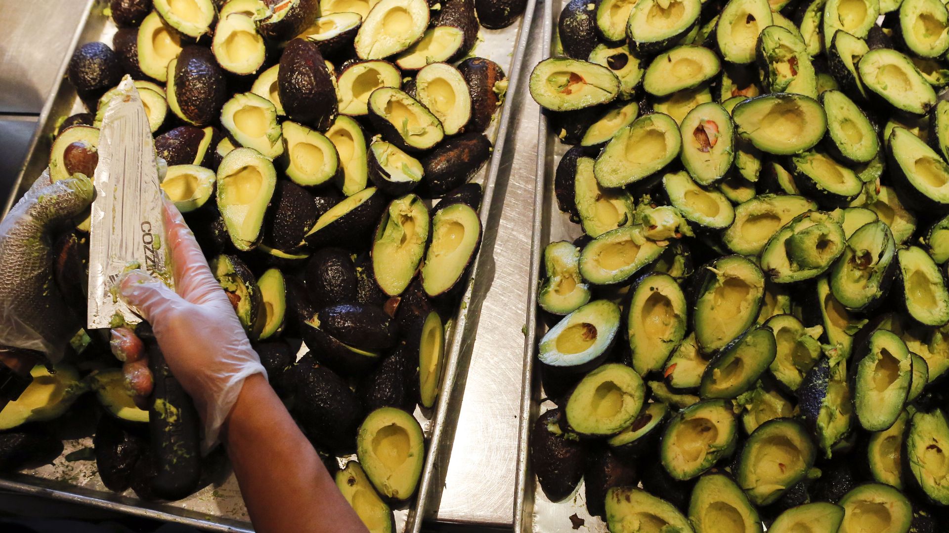 A huge pile of avocados