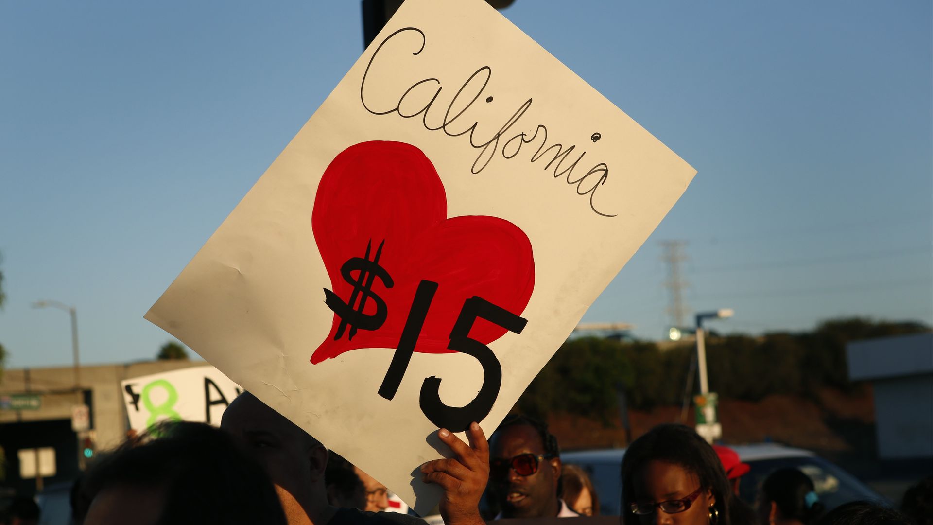 Fast-food workers and supporters organized by the Service Employees International Union (SEIU) protest outside of a Burger King.
