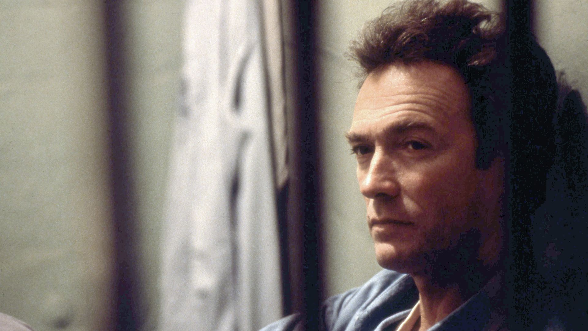 Photo of Clint Eastwood behind bars in a scene from "Escape from Alcatraz"