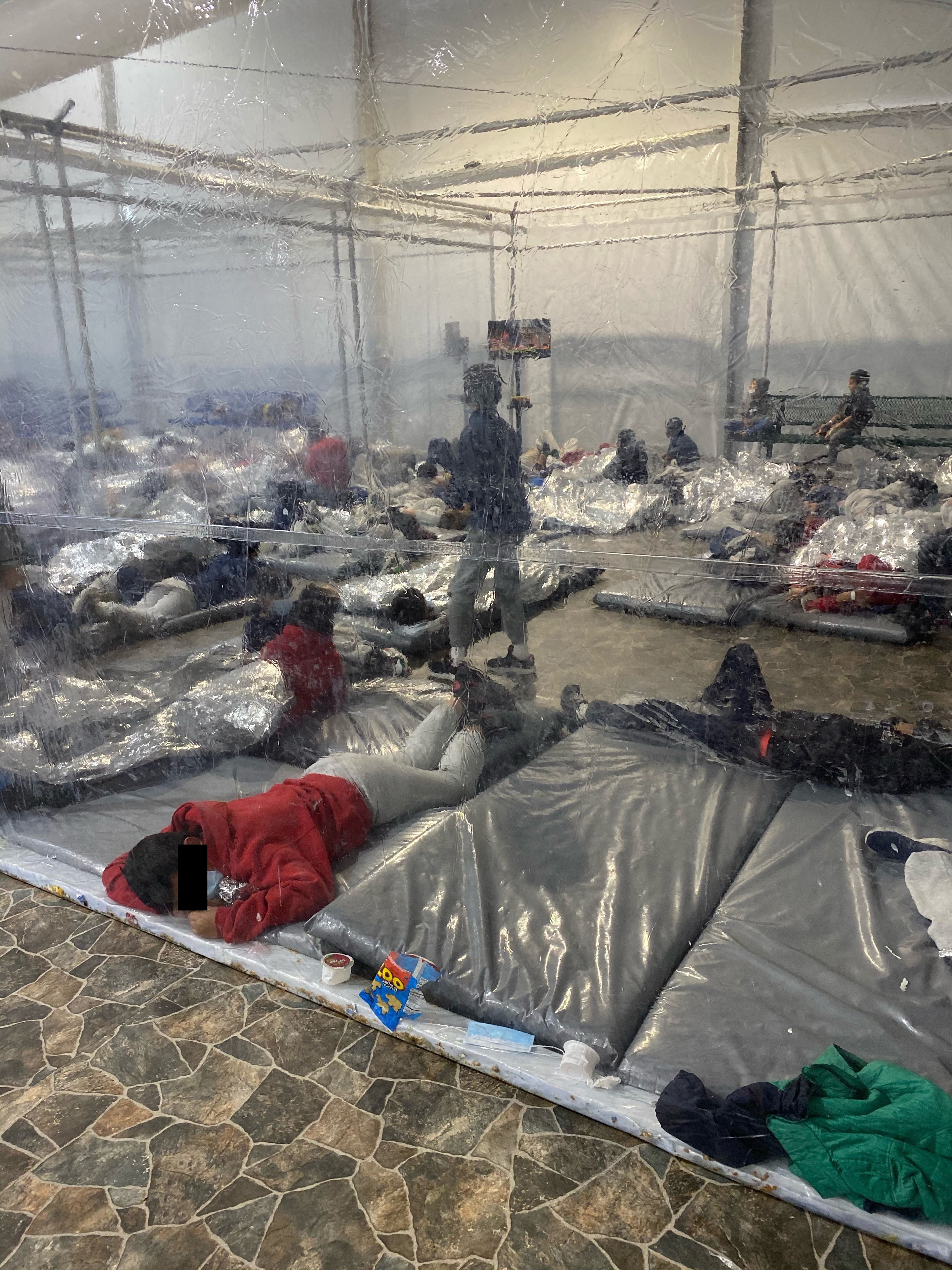 Migrants crowded in border facility in Donna, Texas