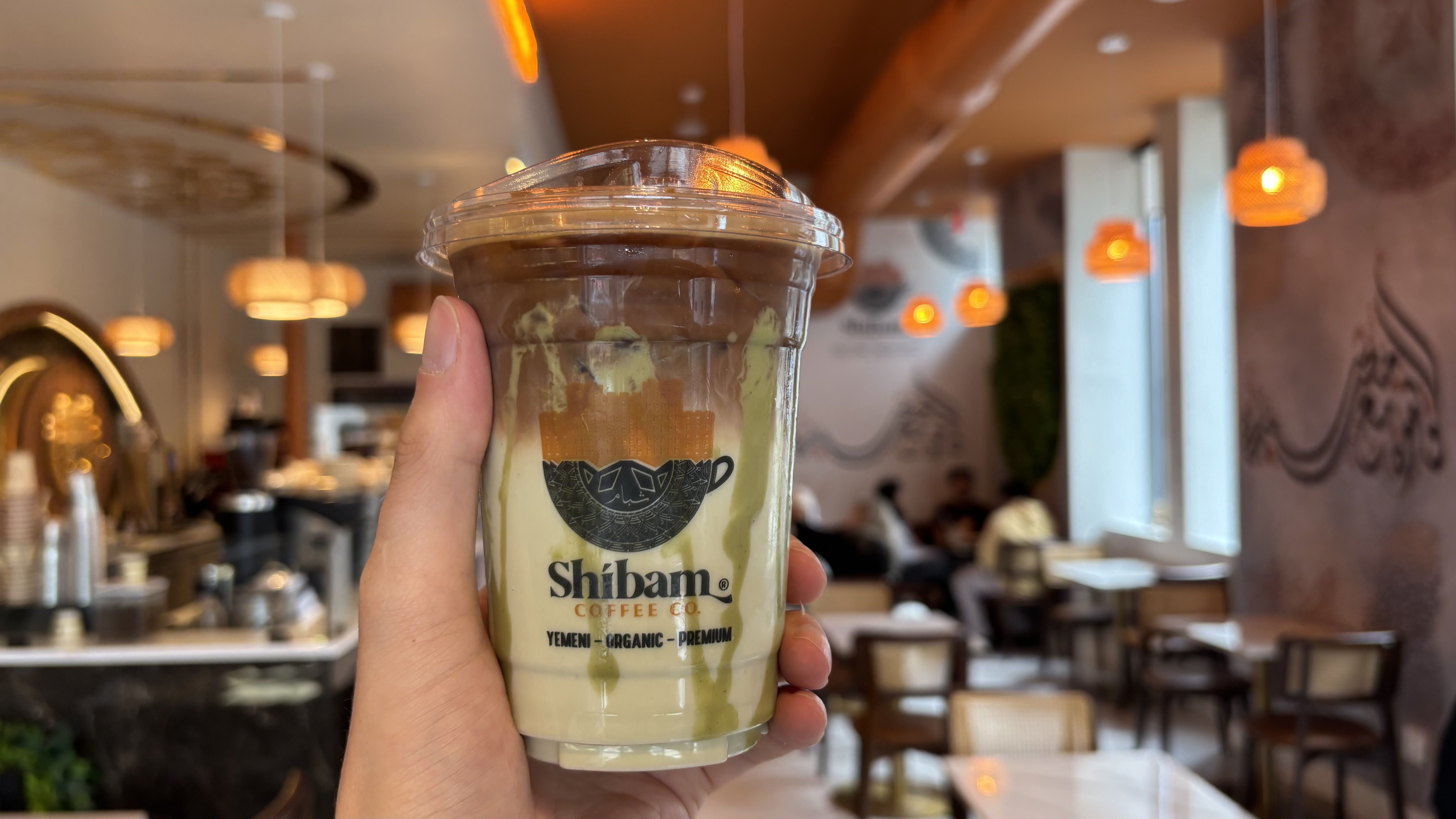 An iced pistachio latte at Shibam Coffee in Pittsburgh's Oakland neighborhood