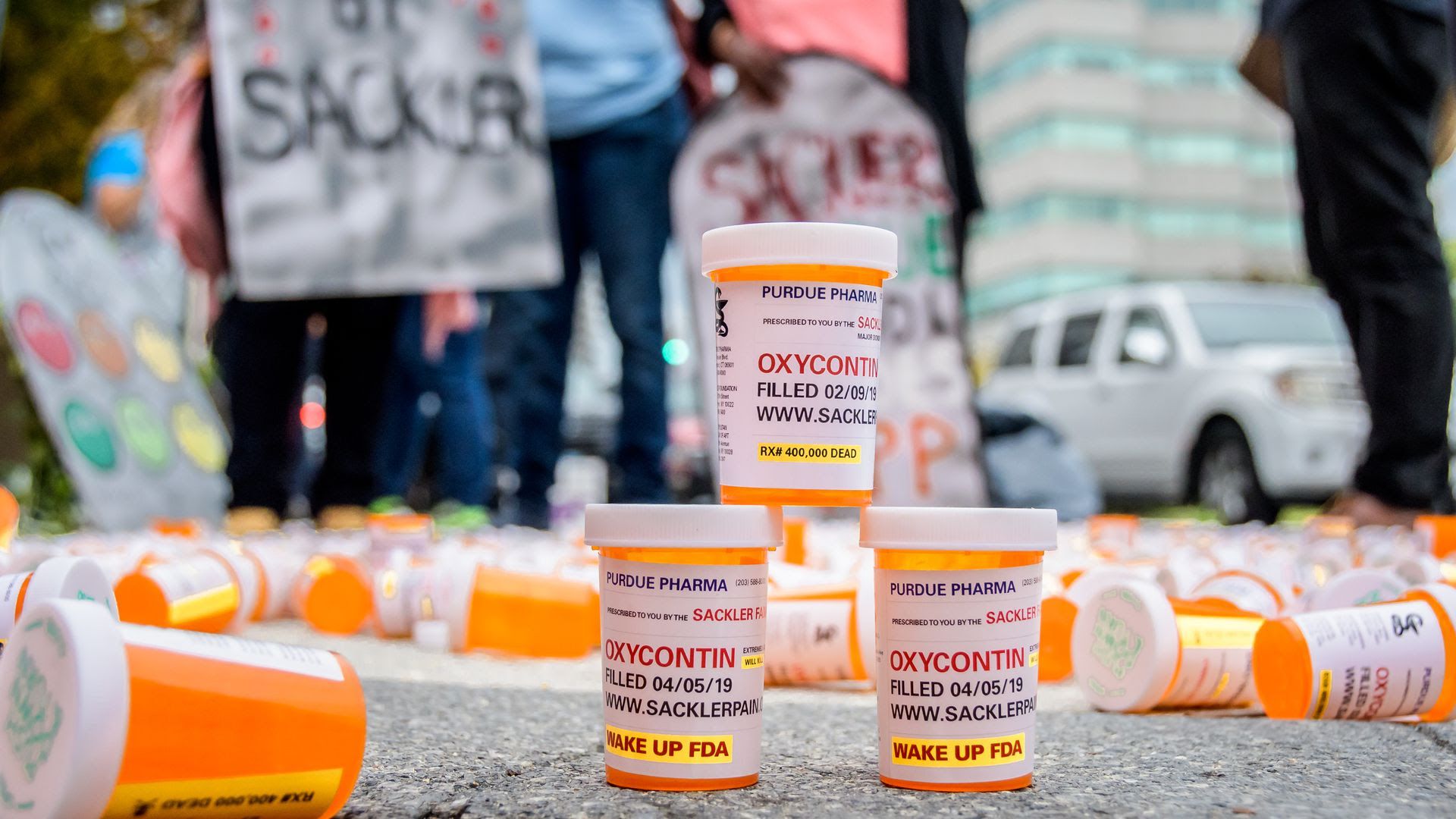 Protestors outside of Purdue Pharma's headquarters last month.