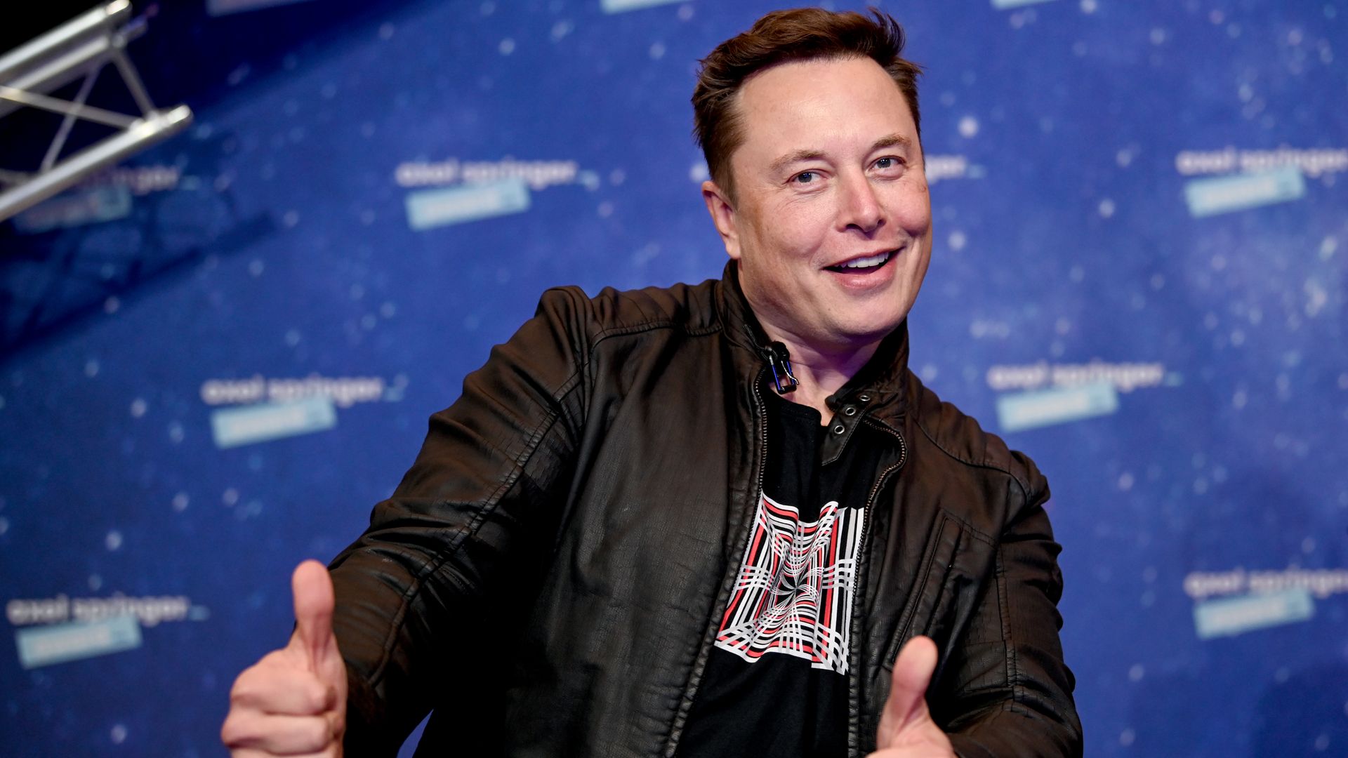 SpaceX owner and Tesla CEO Elon Musk poses as he arrives on the red carpet for the Axel Springer Awards ceremony, in Berlin, on December 1, 2020. 
