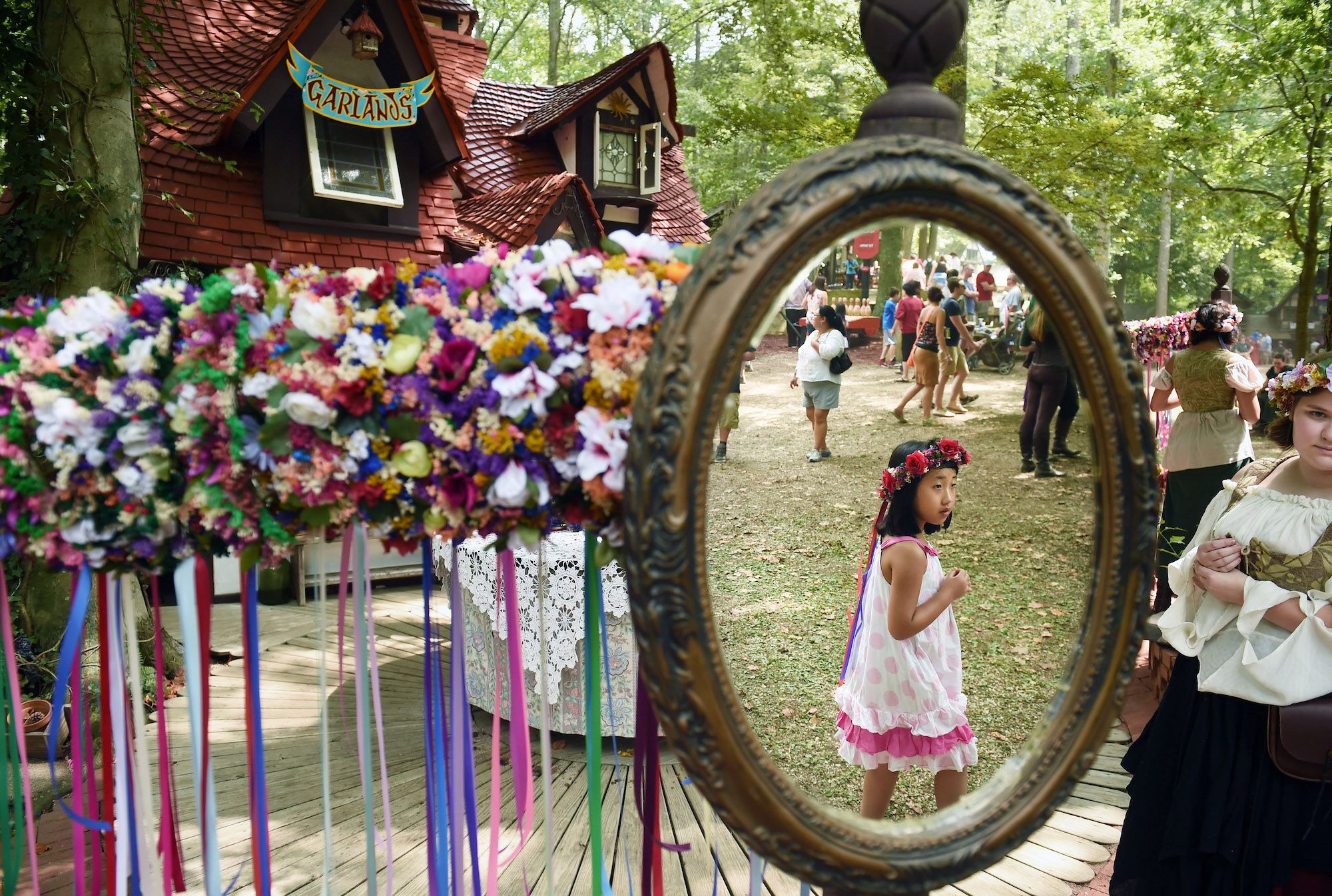 A girl in a flower crown at the Maryland Renaissance Fair