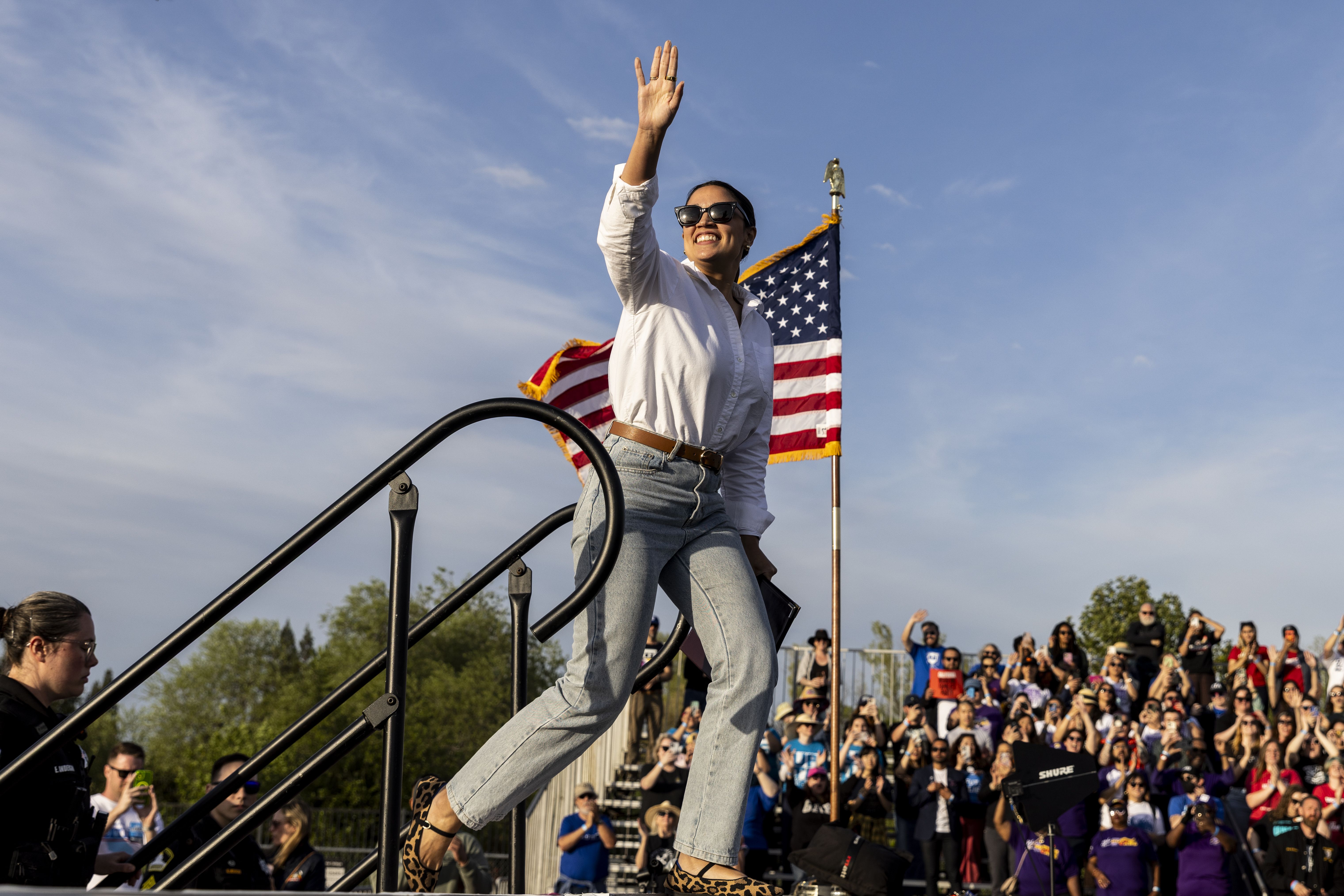 Rep. Alexandria Ocasio-Cortez (D-N.Y.) speaks to a "Fighting Oligarchy" rally at Folsom Lake College in Sacramento County, Calif., last week. Photo: Stephen Lam/San Francisco Chronicle via Getty Images