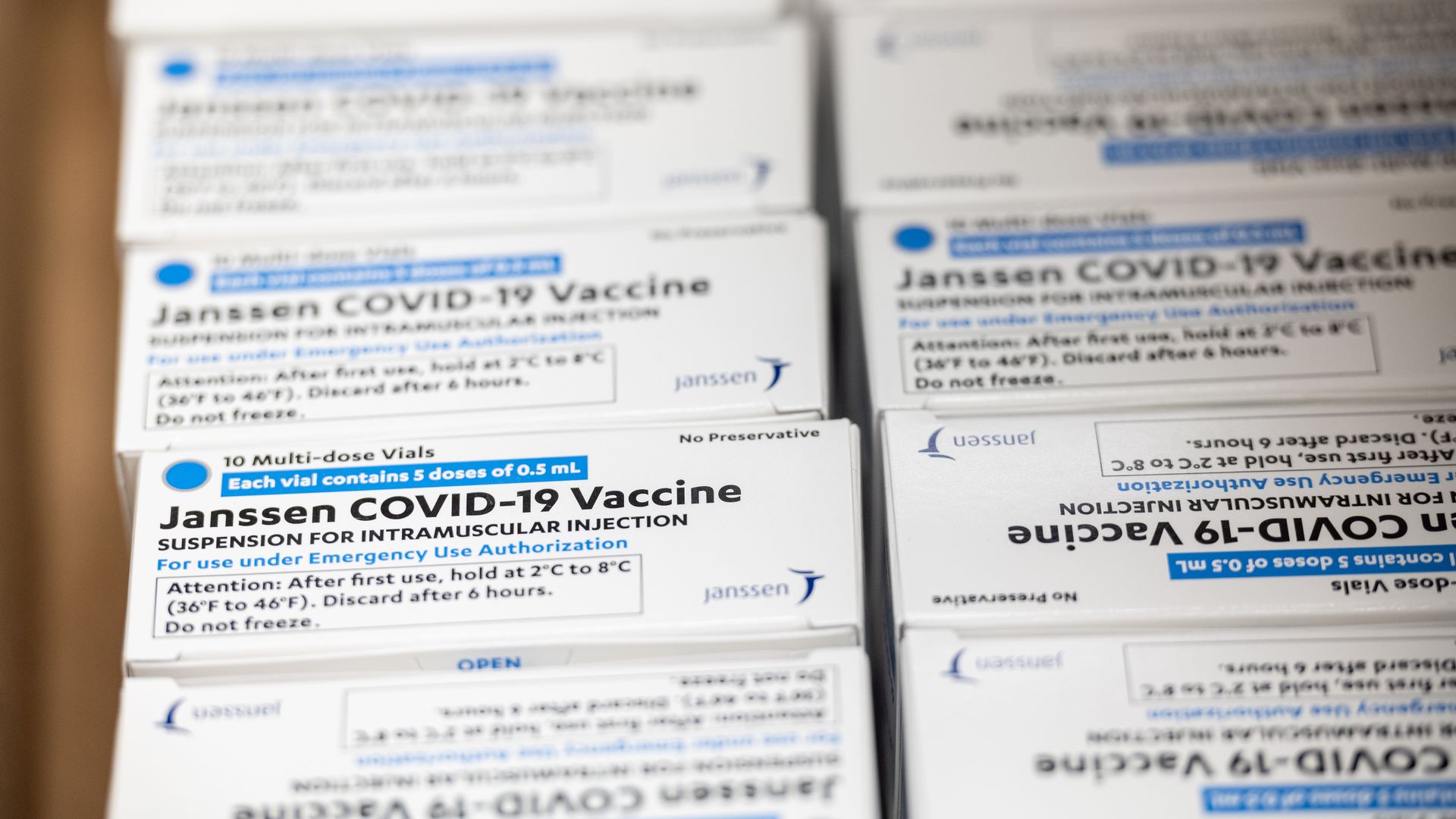 Boxes containing vials of the Janssen COVID-19 vaccine