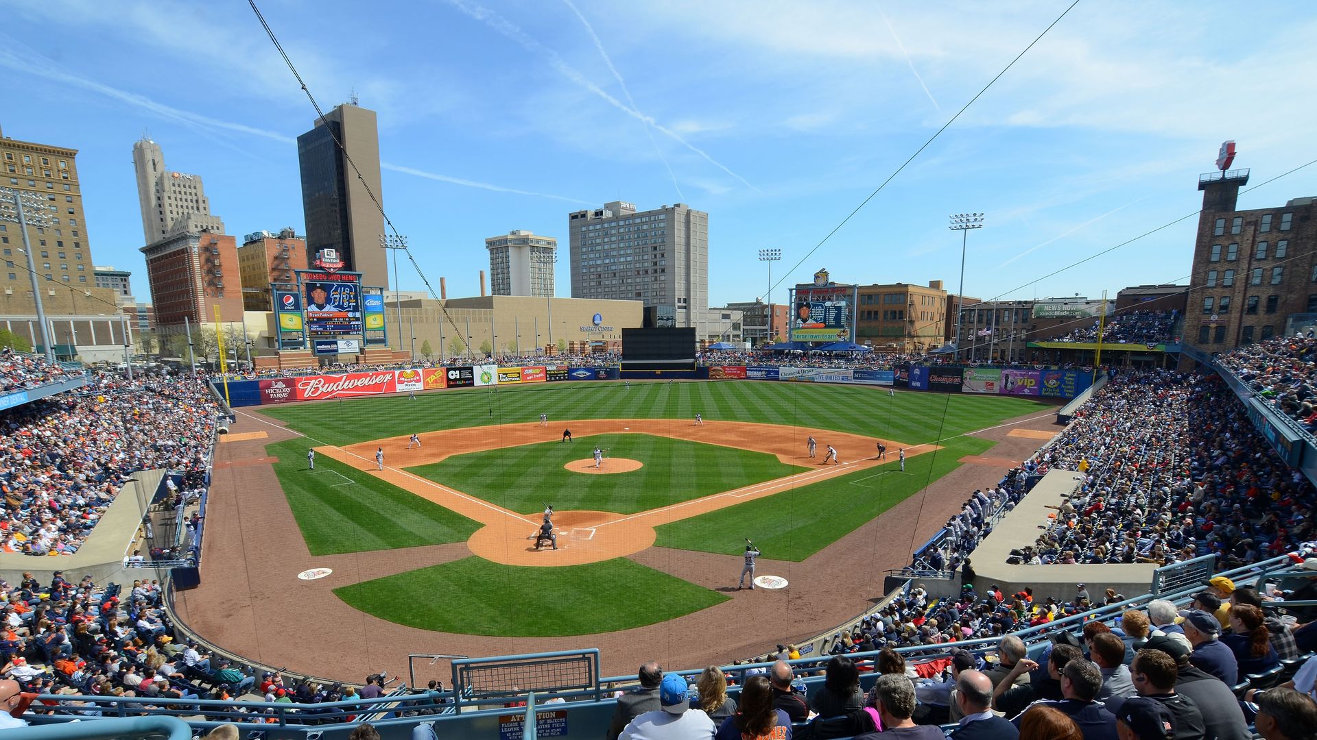 A baseball diamond surrounded by fans