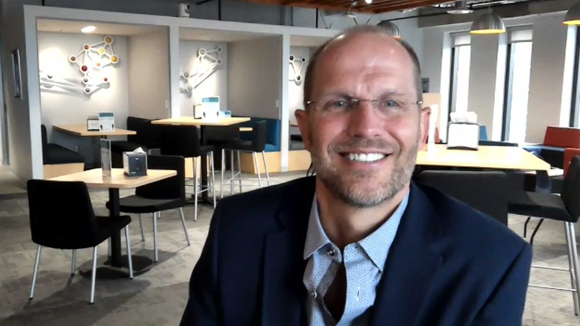Jamf CEO Dean Hager, alone in the company's Minnesota offices on IPO day. Photo: Ina Fried/Axios