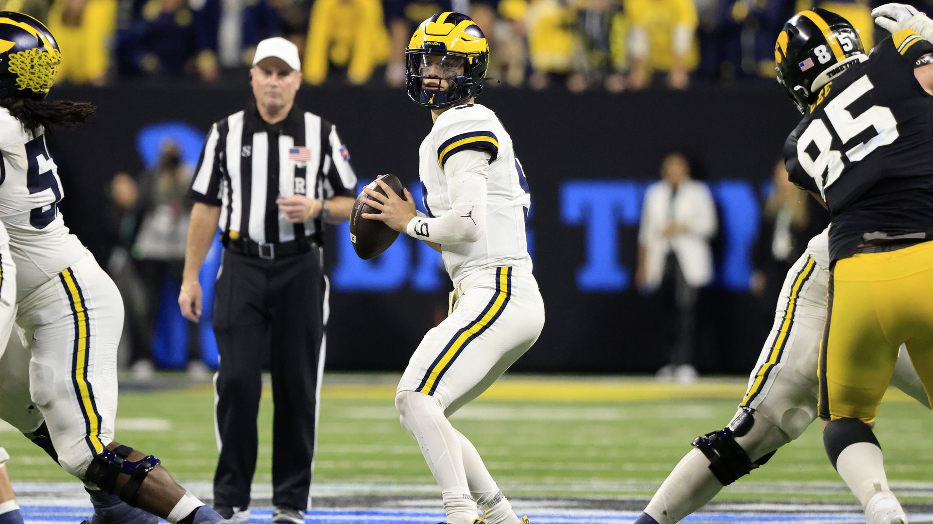Michigan QB J.J. McCarthy looks to pass against Iowa in the Big Ten Championship game.