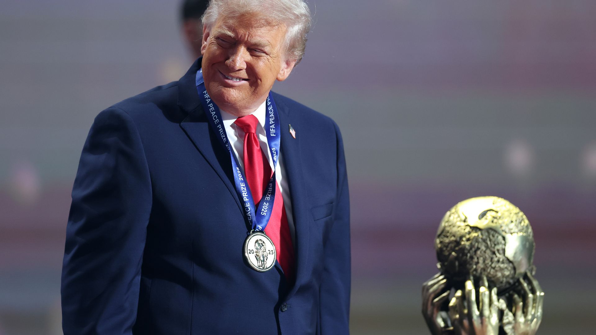 U.S. President Donald Trump receives the FIFA Peace Prize during the FIFA World Cup 2026 Official Draw at John F. Kennedy Center for the Performing Arts on December 05, 2025 in Washington, DC. (Photo by Dan Mullan/Getty Images)