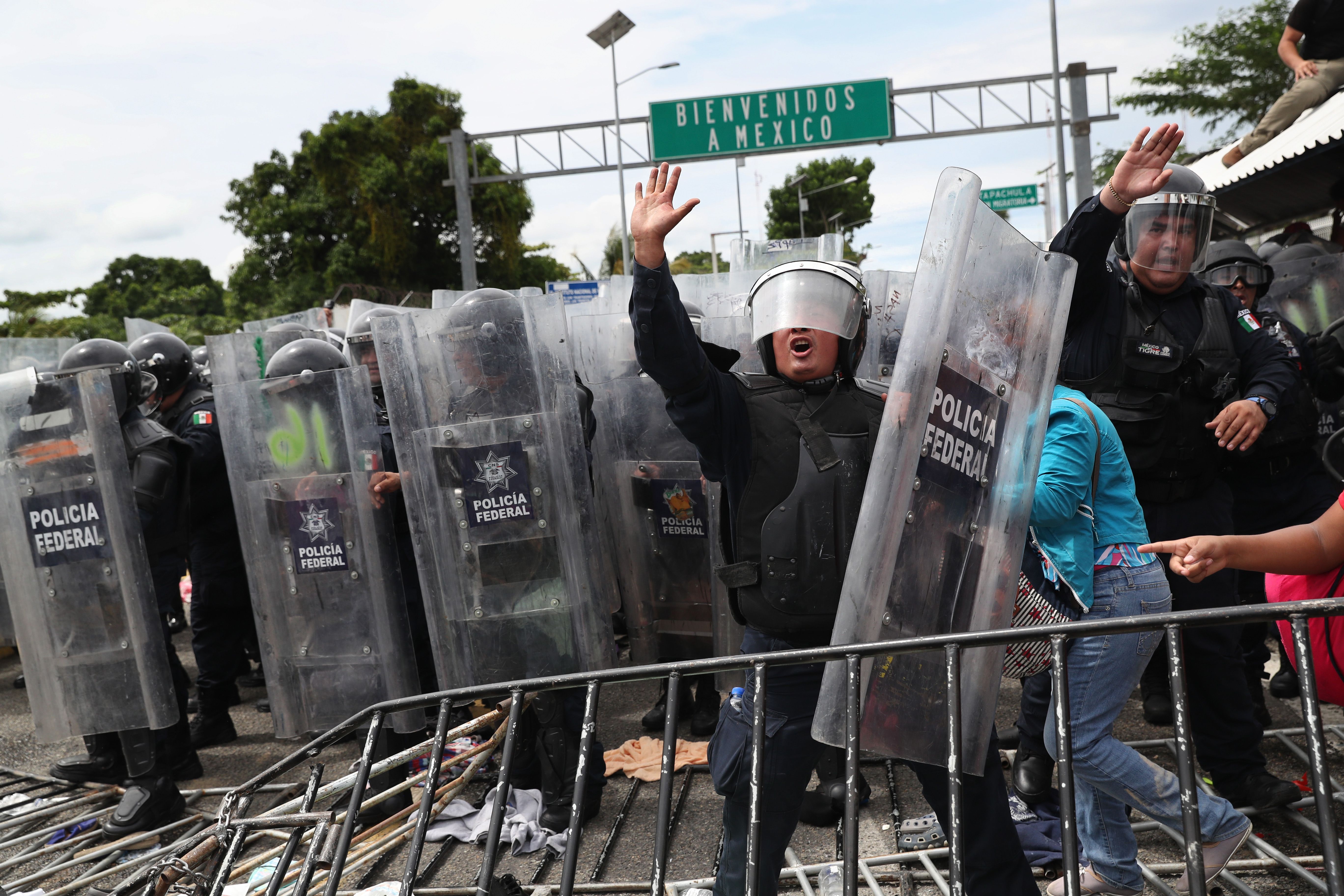 Mexican authorities holding riot shields