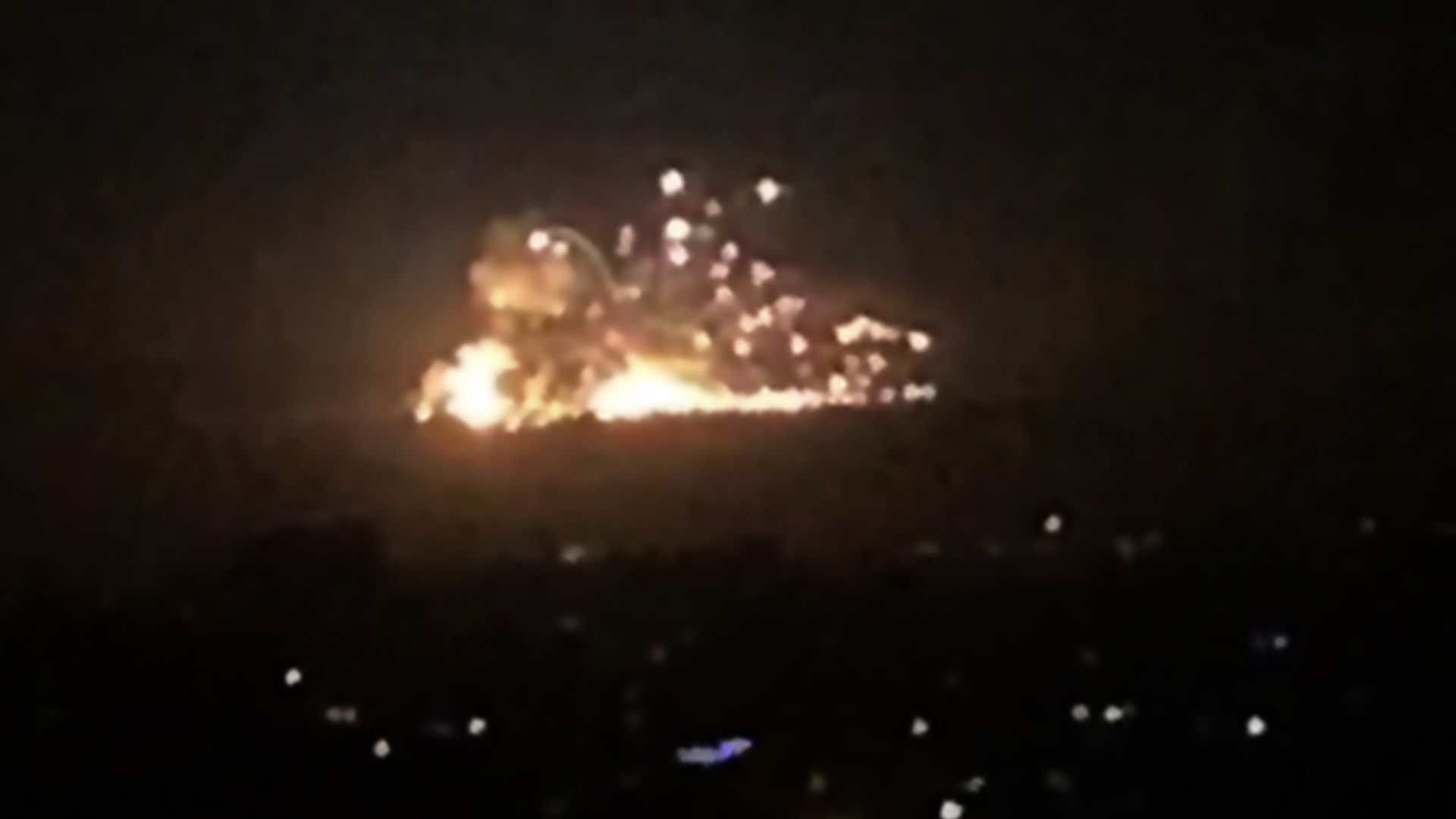 An image grab shows on November 20, 2019 smoke and fire billowing during a reported Israeli air strike on the outskirts of Damascus