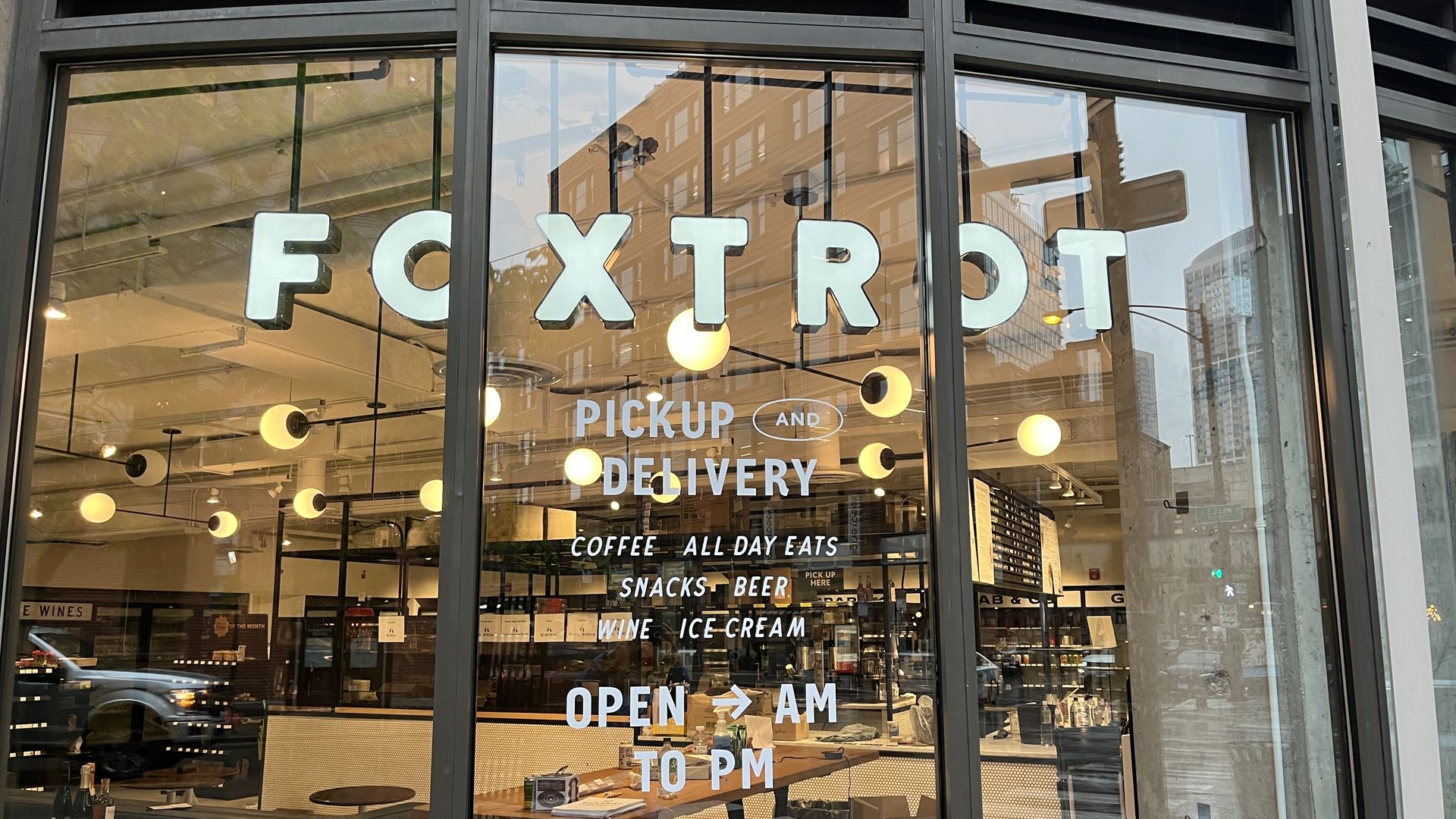 Photo of a window that says "Foxtrot" 