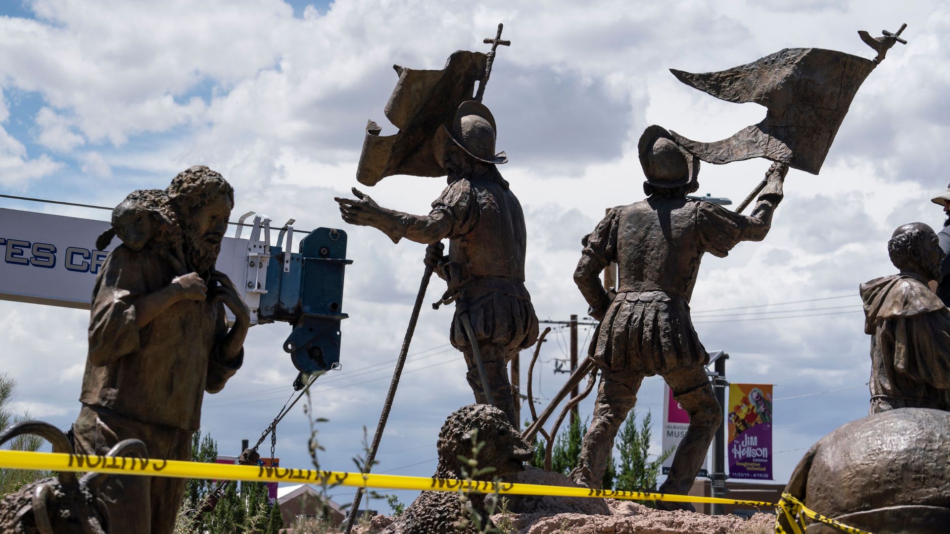 A sculpture of Juan de Onate's group of settlers colonizing New Mexico is pictured as workers for the City of Albuquerque remove a sculpture